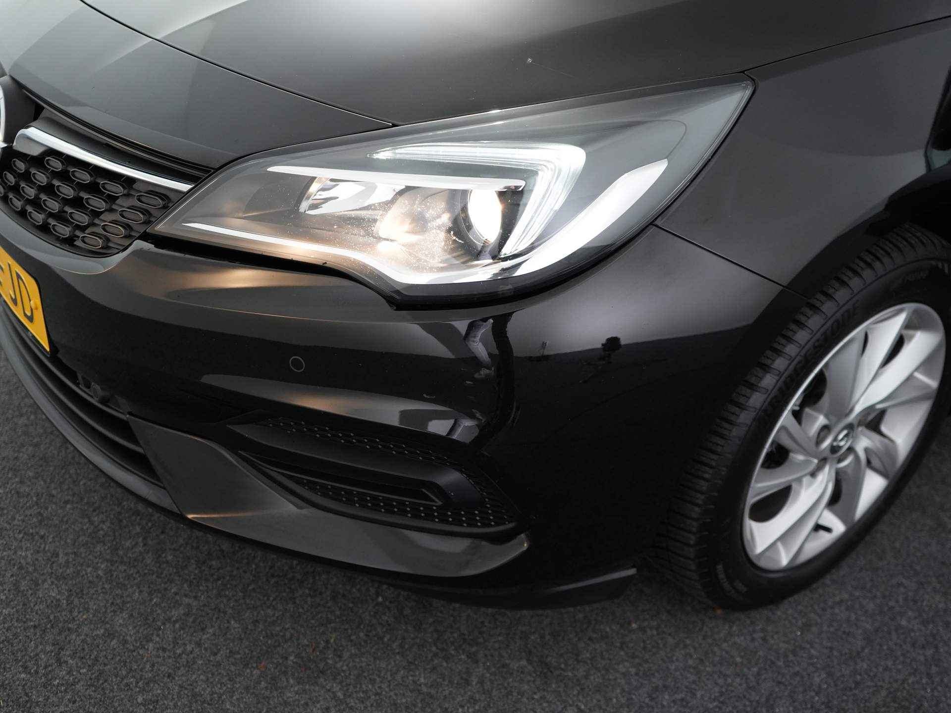 Opel Astra 1.2 Edition Navigatie | Cruise control | parkeersensoren voor/achter| Climate control | - 13/38
