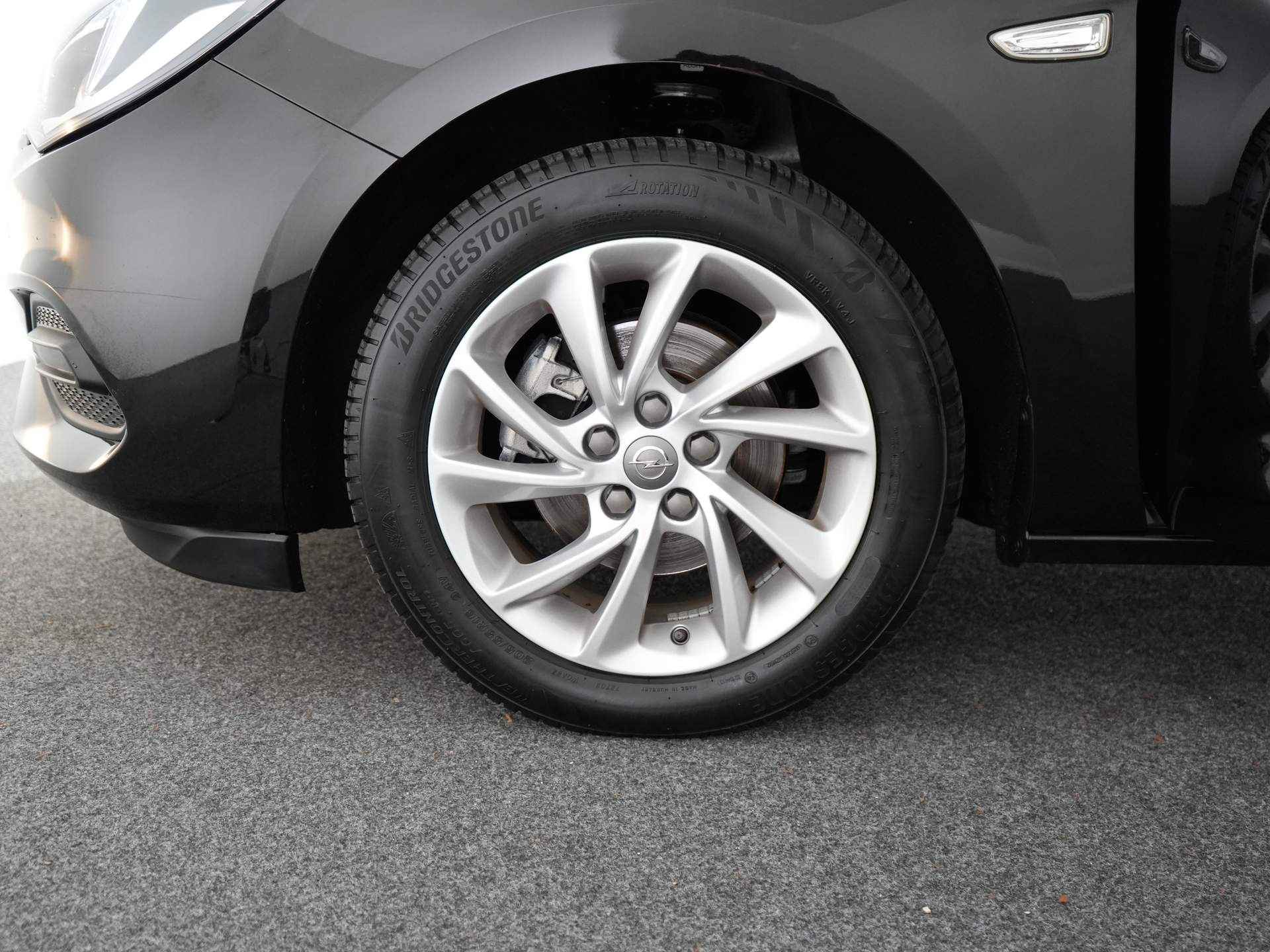 Opel Astra 1.2 Edition Navigatie | Cruise control | parkeersensoren voor/achter| Climate control | - 14/38