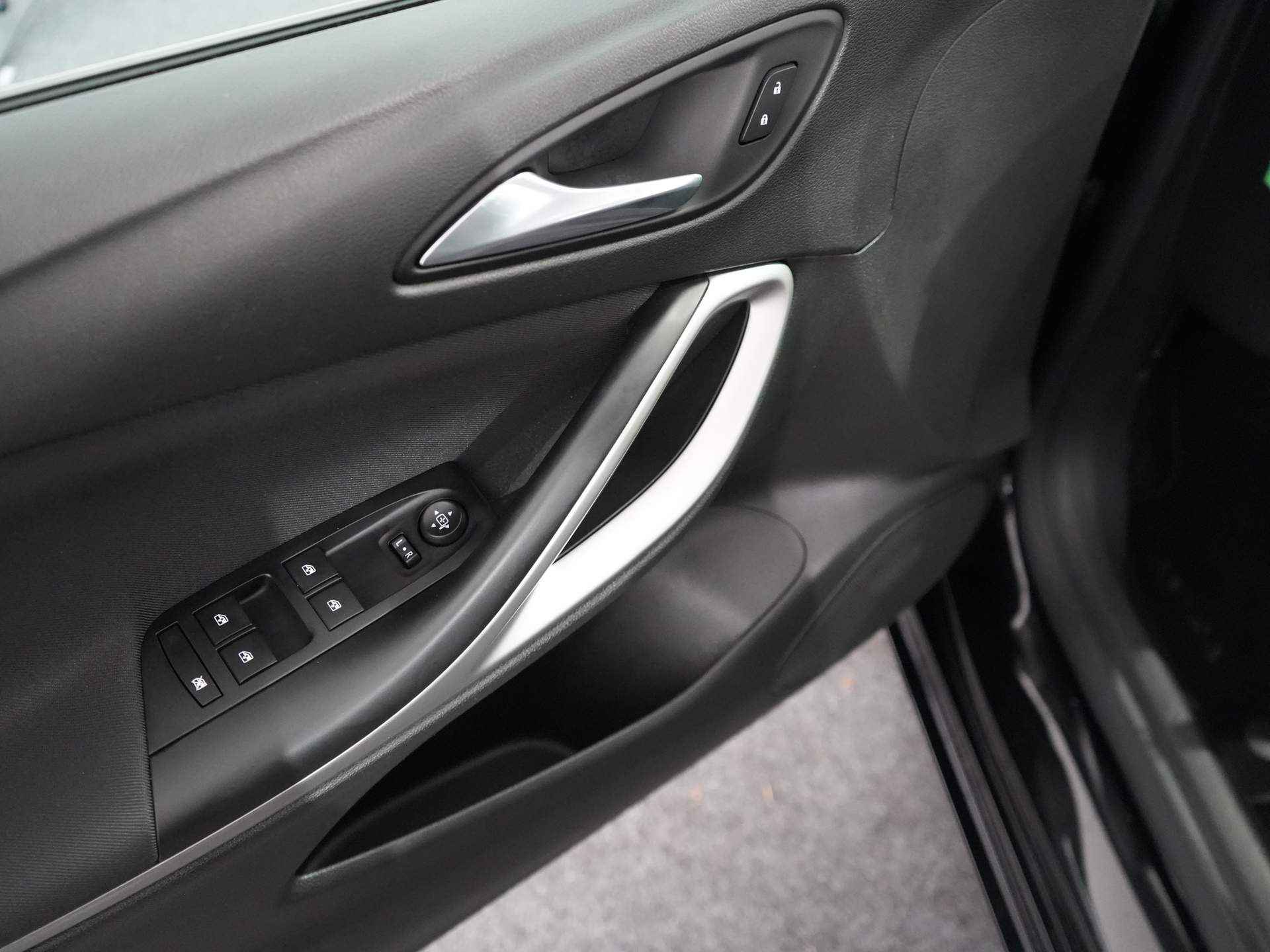 Opel Astra 1.2 Edition Navigatie | Cruise control | parkeersensoren voor/achter| Climate control | - 21/38