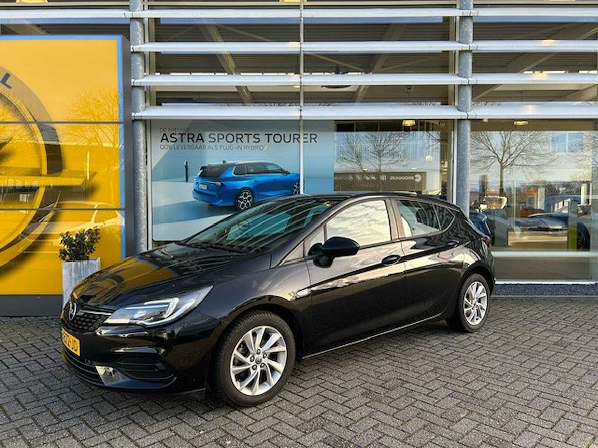 Opel Astra 1.2 Edition Navigatie | Cruise control | parkeersensoren voor/achter| Climate control | - 28/38