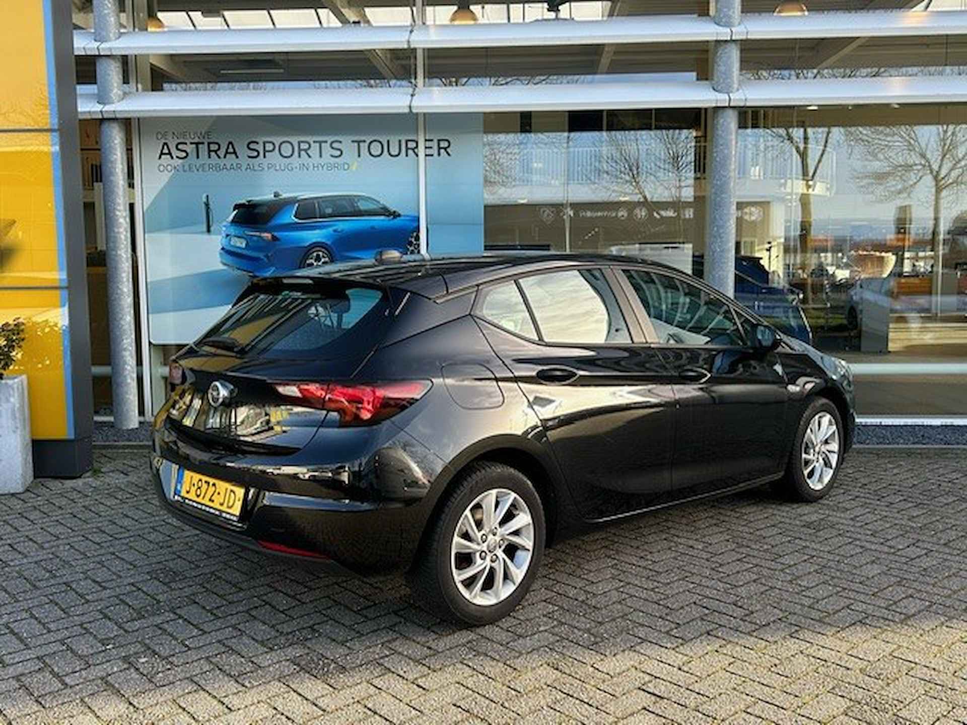 Opel Astra 1.2 Edition Navigatie | Cruise control | parkeersensoren voor/achter| Climate control | - 32/38