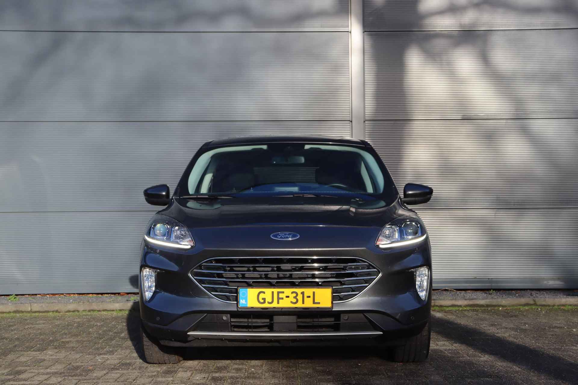 Ford Kuga 2.5 PHEV Titanium / Navi / Carplay / Keyless / Achterklep elektrisch - 2/36