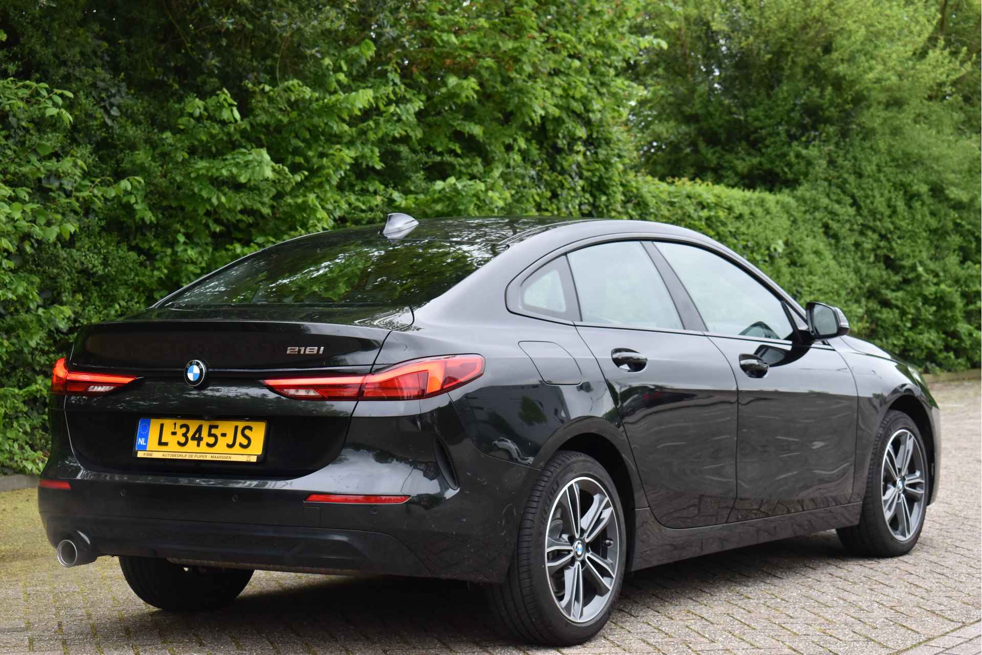 BMW 2 Serie Gran Coupé 218i Business Edition Plus NL-AUTO, CAMERA, LEDER, SFEERVERLICHTING, CARPLAY, FULL LED, NAP - 8/65