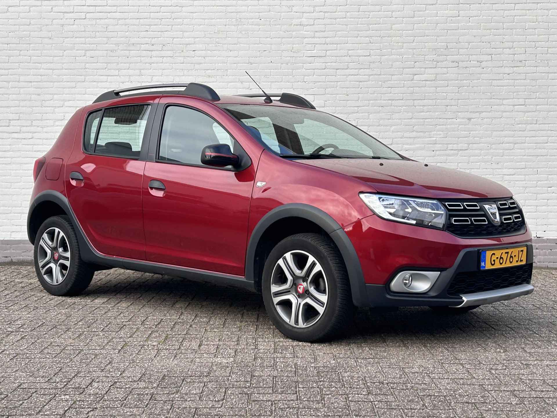 Dacia Sandero 0.9 TCe Tech Road / Navigatie / Airco / Parkeersensoren / Cruise / Clima / DAB / LED / NAP / ALL Season Banden / - 32/39