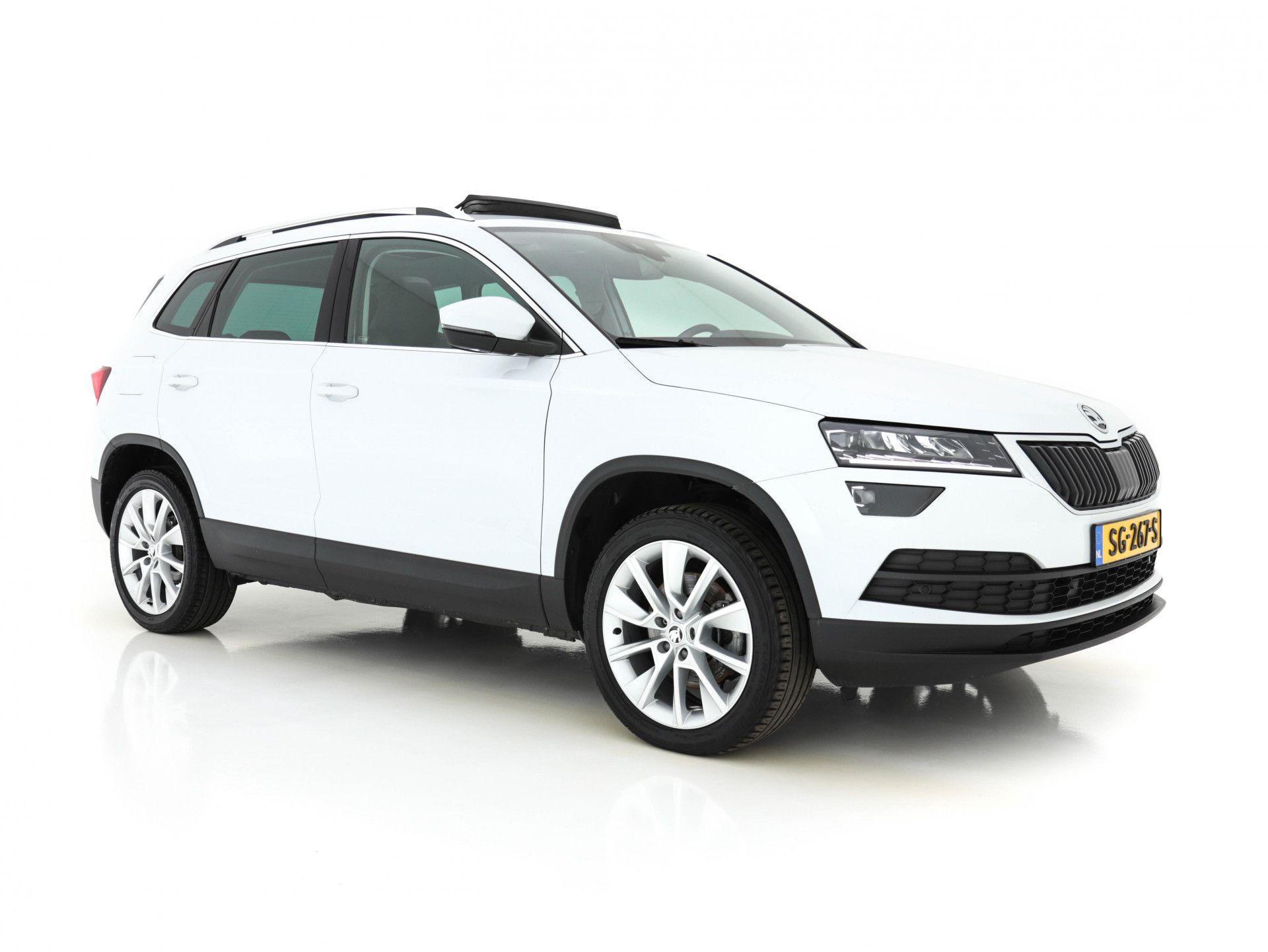 Škoda Karoq 1.6 TDI Style Business Travel-Pack Pro *PANO | FULL-LED | SOFT-VOLLEDER | NAVI-FULLMAP | CANTON-SURROUND-SOUND | ADAPTIVE-CRUISE | KEYLESS | CAMERA | DAB | AMBIENT-LIGHT |  TOWBAR | SPORT-SEATS | 18"ALU*