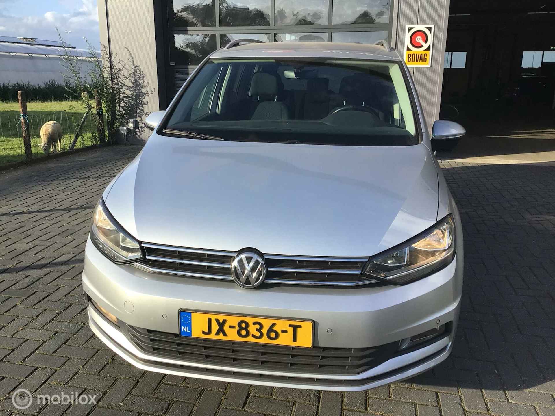 Volkswagen Touran 1.2 TSI Comfortline 7p. PDC / Cruise - 4/30