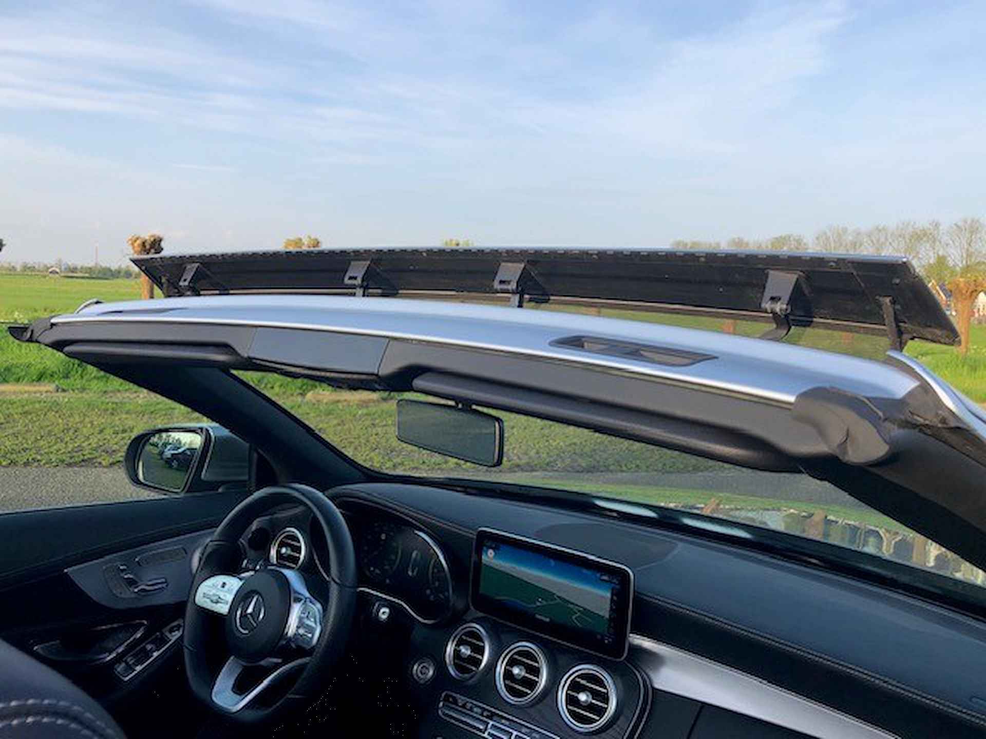 Mercedes-Benz C-Klasse Cabrio 200 4MATIC AMG-LINE AUTOMAAT 1E EIGENAAR!! UNIEK!!! NAVIGATIE, APPLE CARPLAY, NEKVERWARMING, LEER, STOELVERWARMING, GEVENTILEERDE STOELEN, MEMORY STOELEN, 360 GRADEN CAMERA, PARKEERHULP VOOR/ACHTER, WINDSCHERM, MULTIBEAM LED, 18"AMG-VELGEN, ENZ. ENZ. NIEUWPRIJS 77.500,-!! - 24/261