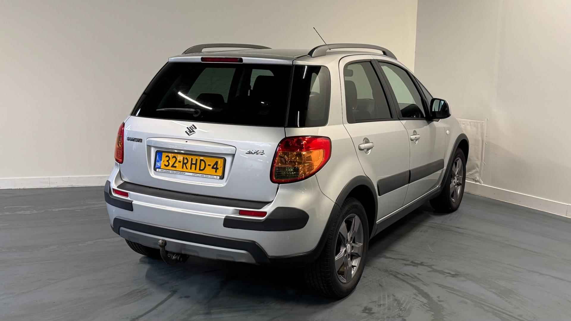 Suzuki SX4 1.6 Limited | PARROT CARKIT | TREKHAAK | KEYLESS ENTRY | NL-AUTO | - 7/27