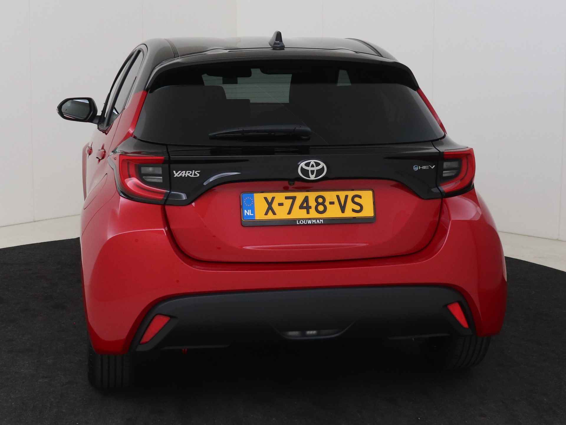 Toyota Yaris Hybrid 115 First Edition *Demo | Zwart gewrapt dak | Navigatie | Apple Carplay-Android auto | Camera | - 21/40