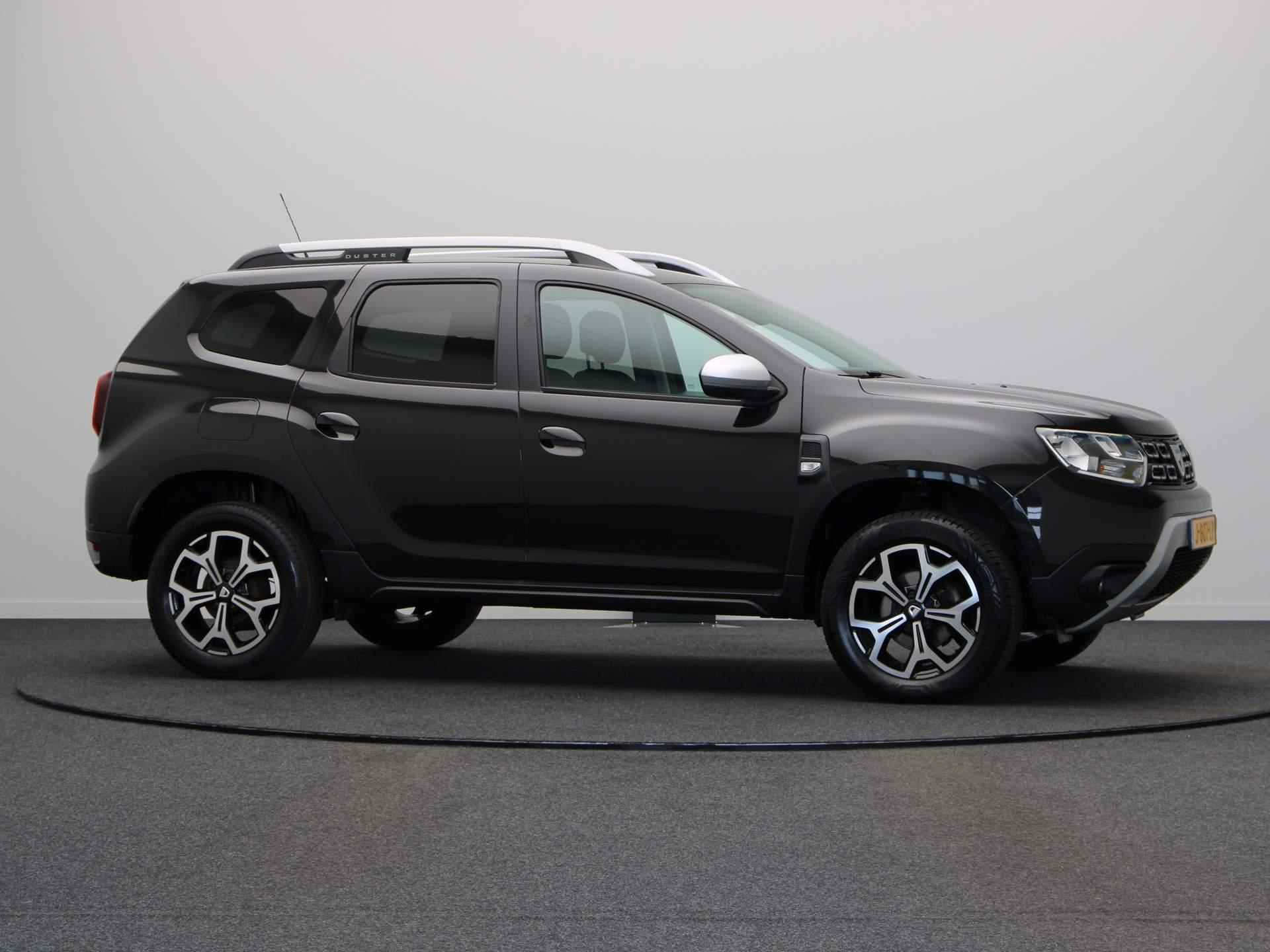 Dacia Duster TCe 100pk Bi-Fuel Prestige | Trekhaak | Achteruitrijcamera | Climate Control | Navigatie | - 18/47