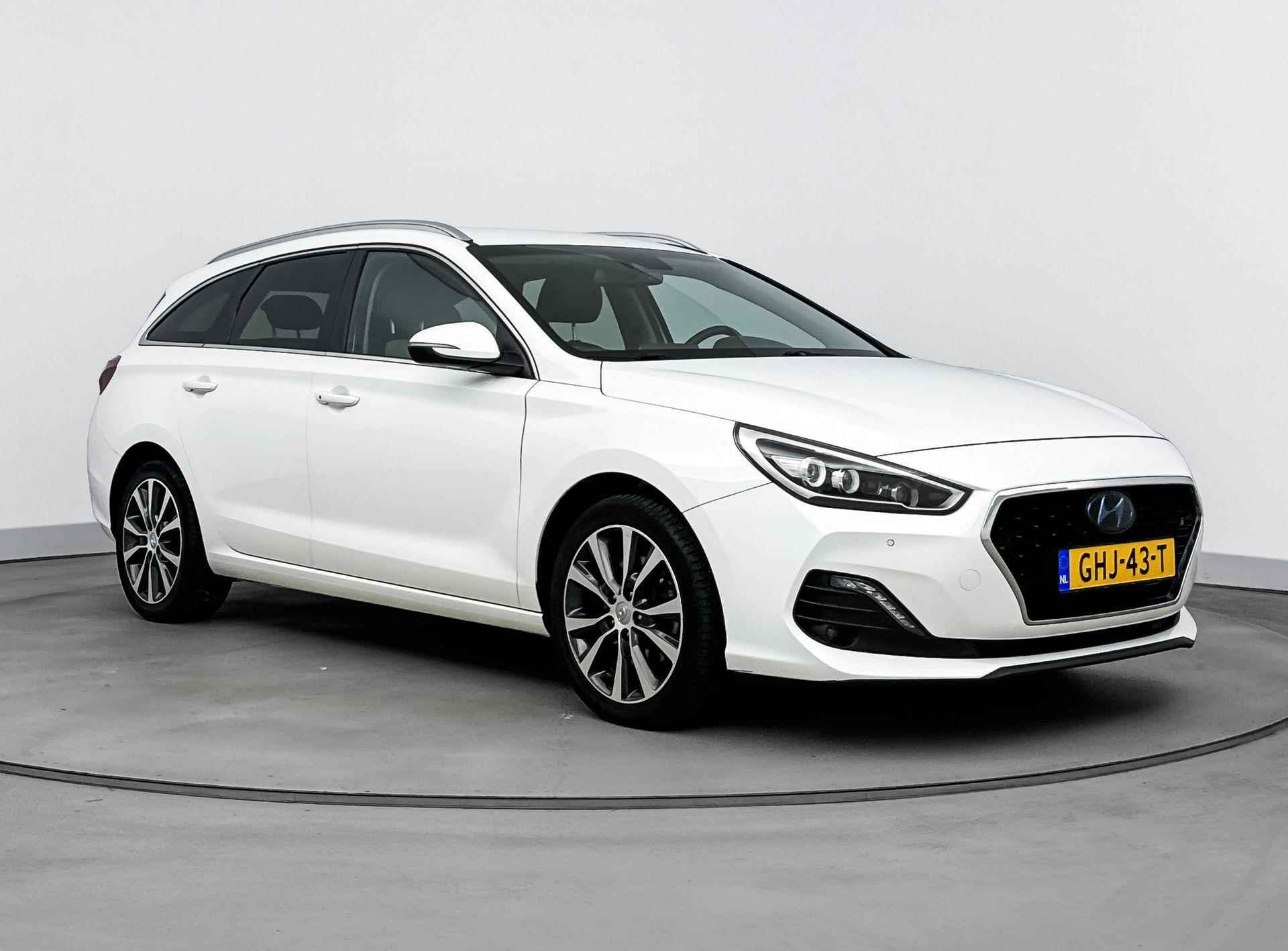 Hyundai i30 Wagon 1.4 T-GDI Premium | Sportstoelen | Stuur + stoelverwarming | Nieuwe All Season | 17" Lm-wielen | Navigatie | Camera | - 8/33