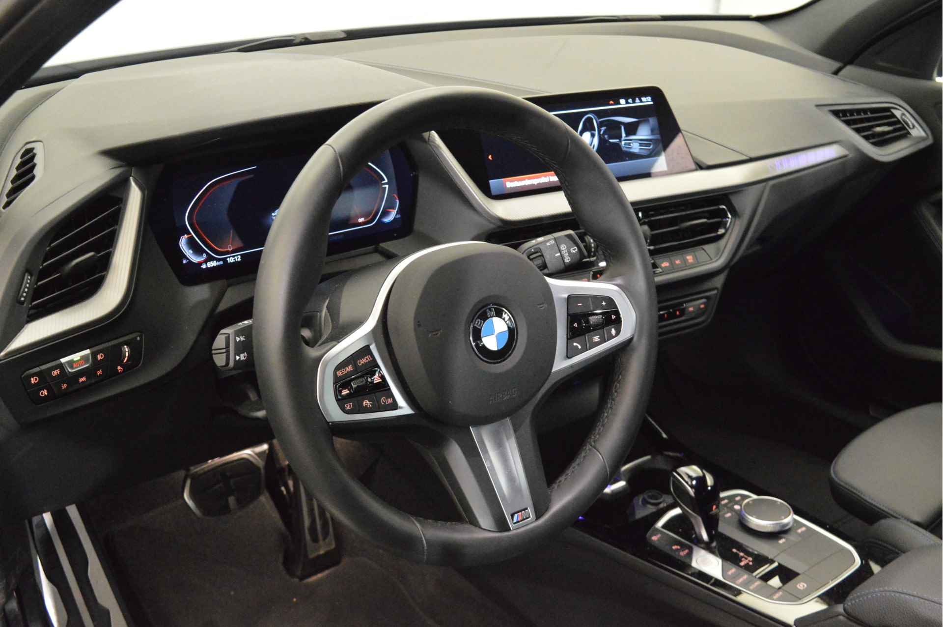 BMW 1-serie 118i M Sport Automaat / Sportstoelen / Active Cruise Control / LED / M Sportonderstel / Live Cockpit Professional - 7/19