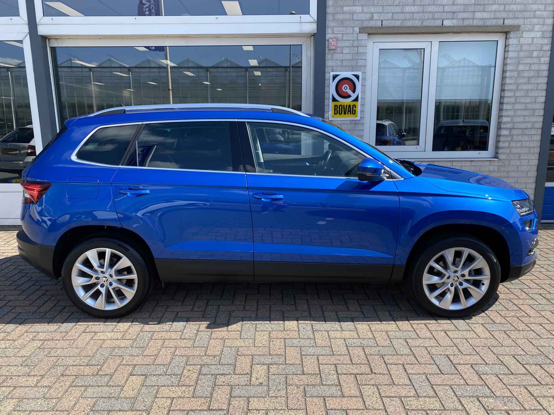 Škoda Karoq 1.0 TSI Business Edition / TREKHAAK/ CAMERA/ PARK. SENSOREN/ LED/ CRUISE/ KEYLESS/ APP CONNECT/ NAVI/ CLIMA/ DAB/ 18" LMV/ - 37/41