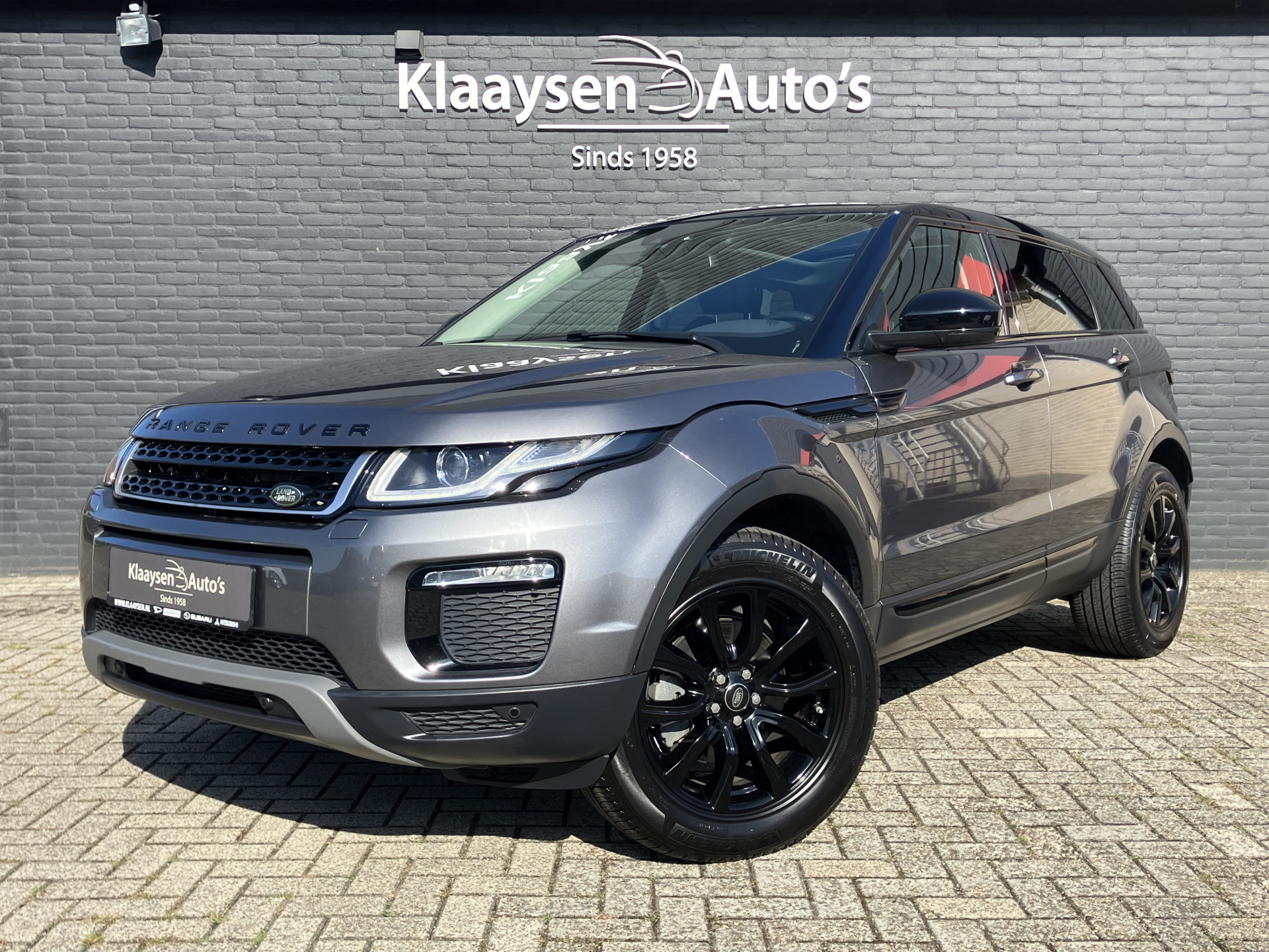 Land Rover Range Rover Evoque 2.0 Si4 SE AWD AUT. | 1e eigenaar | dealer onderhouden | navigatie | leer | cruise control | camera | panoramadak