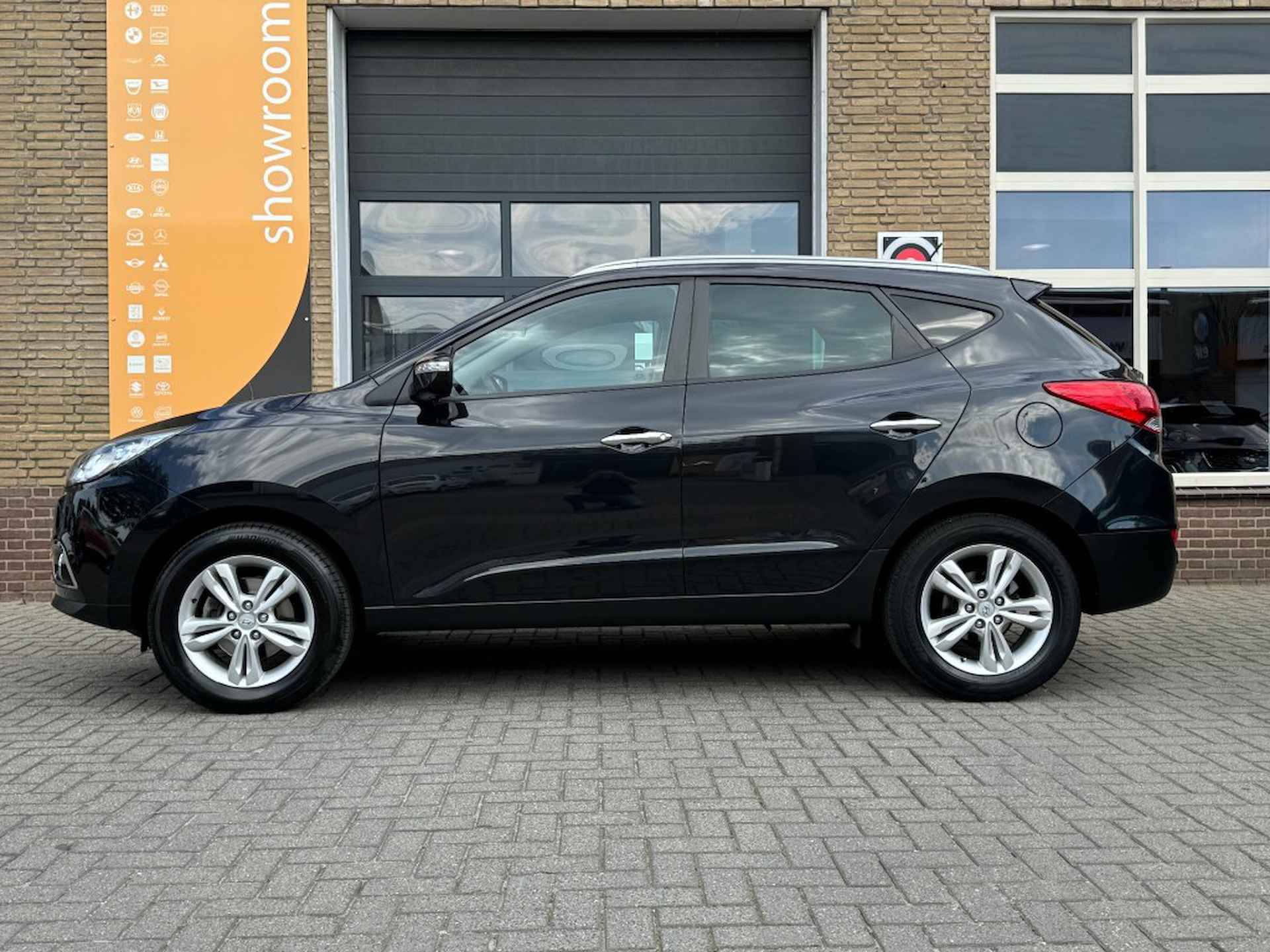 HYUNDAI Ix35 2.0I STYLE HALF LEER/CLIMA/CRUISE/LMV/NL-AUTO/ZEER MOOI! - 8/39