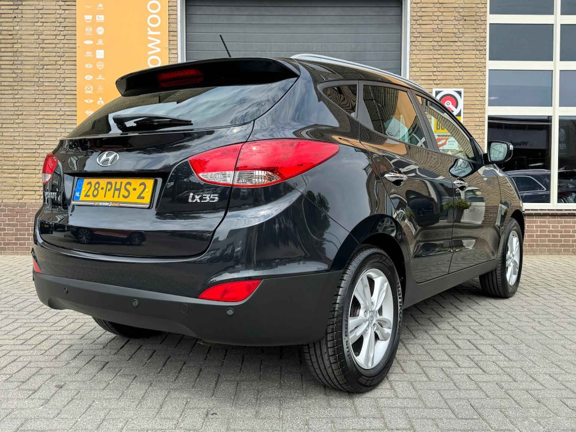 HYUNDAI Ix35 2.0I STYLE HALF LEER/CLIMA/CRUISE/LMV/NL-AUTO/ZEER MOOI! - 10/39