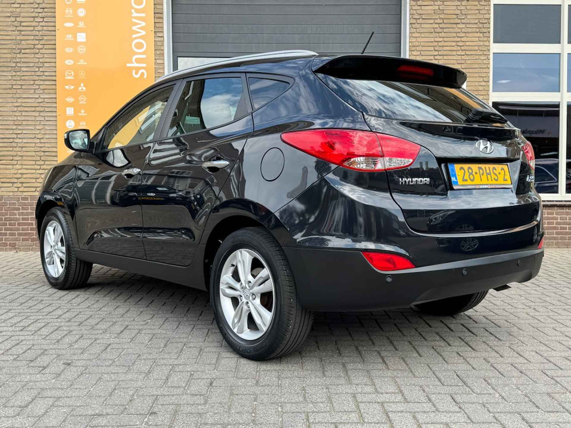 HYUNDAI Ix35 2.0I STYLE HALF LEER/CLIMA/CRUISE/LMV/NL-AUTO/ZEER MOOI! - 15/39