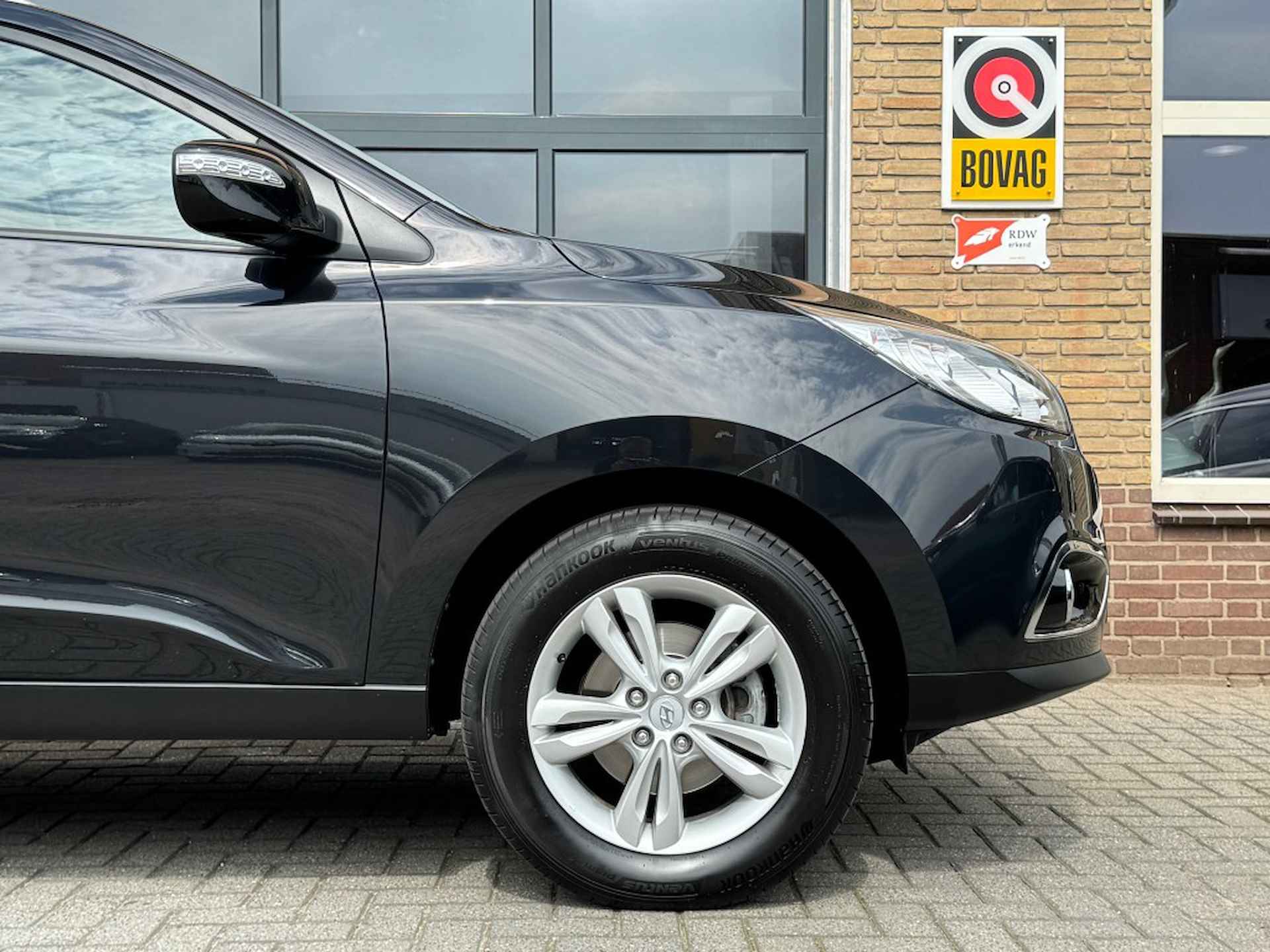 HYUNDAI Ix35 2.0I STYLE HALF LEER/CLIMA/CRUISE/LMV/NL-AUTO/ZEER MOOI! - 27/39