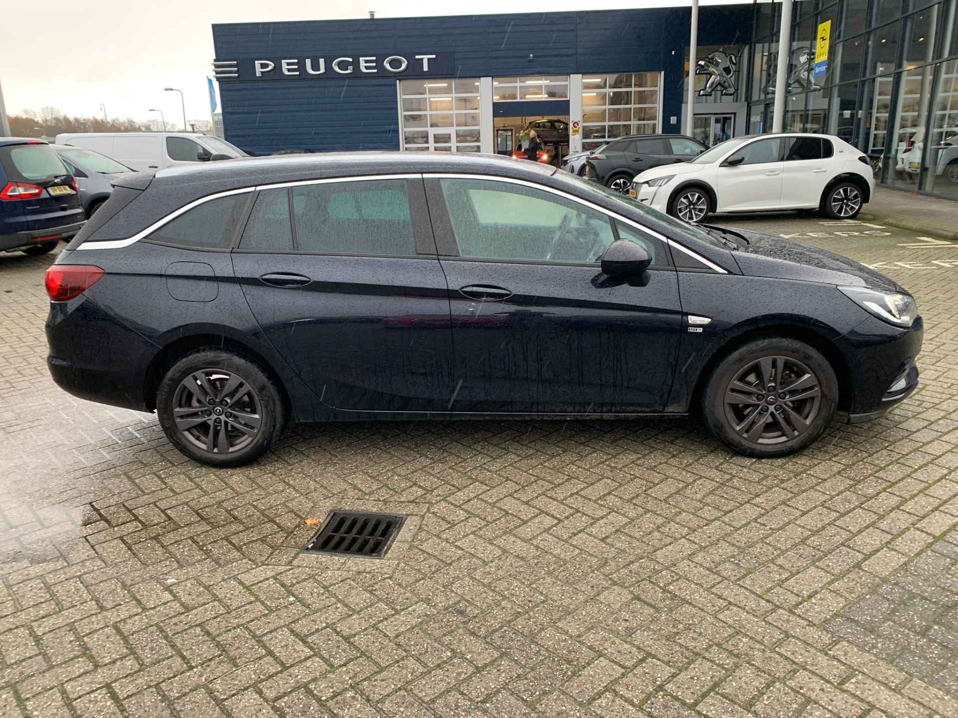 Opel Astra Sports Tourer 1.0 Turbo 120 Jaar Ed. Navi | Camera | LED | St. Verwarming | Privacy Glass | 16" LMV | Net binnen! - 5/24