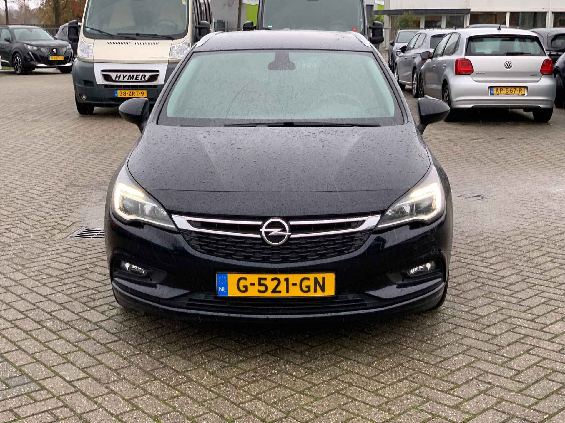 Opel Astra Sports Tourer 1.0 Turbo 120 Jaar Ed. Navi | Camera | LED | St. Verwarming | Privacy Glass | 16" LMV | Net binnen! - 17/24