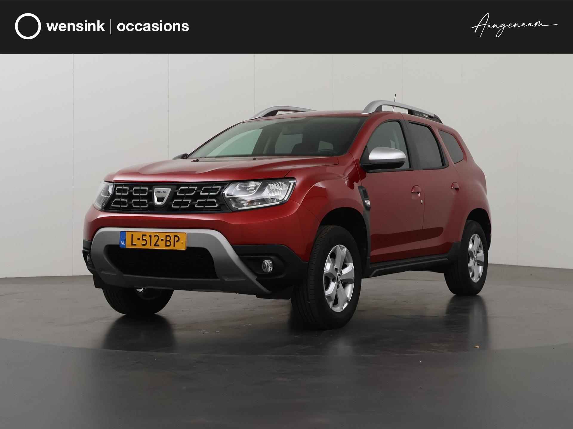 Dacia Duster 1.0 TCe Bi-Fuel Comfort | Trekhaak | Navigatie | Bluetooth | Privacy Glass | Cruise Control | Lichtmetaal | - 1/33