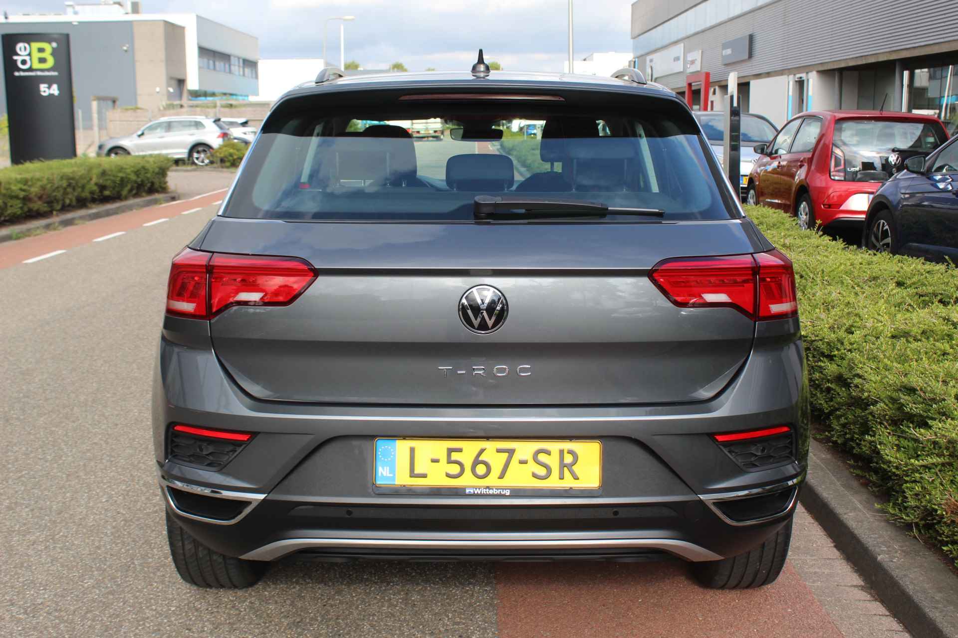 Volkswagen T-Roc 1.0 TSI Style Metallic/ Airco / Parkeersensor V. + A. / 17 lmv - 10/26