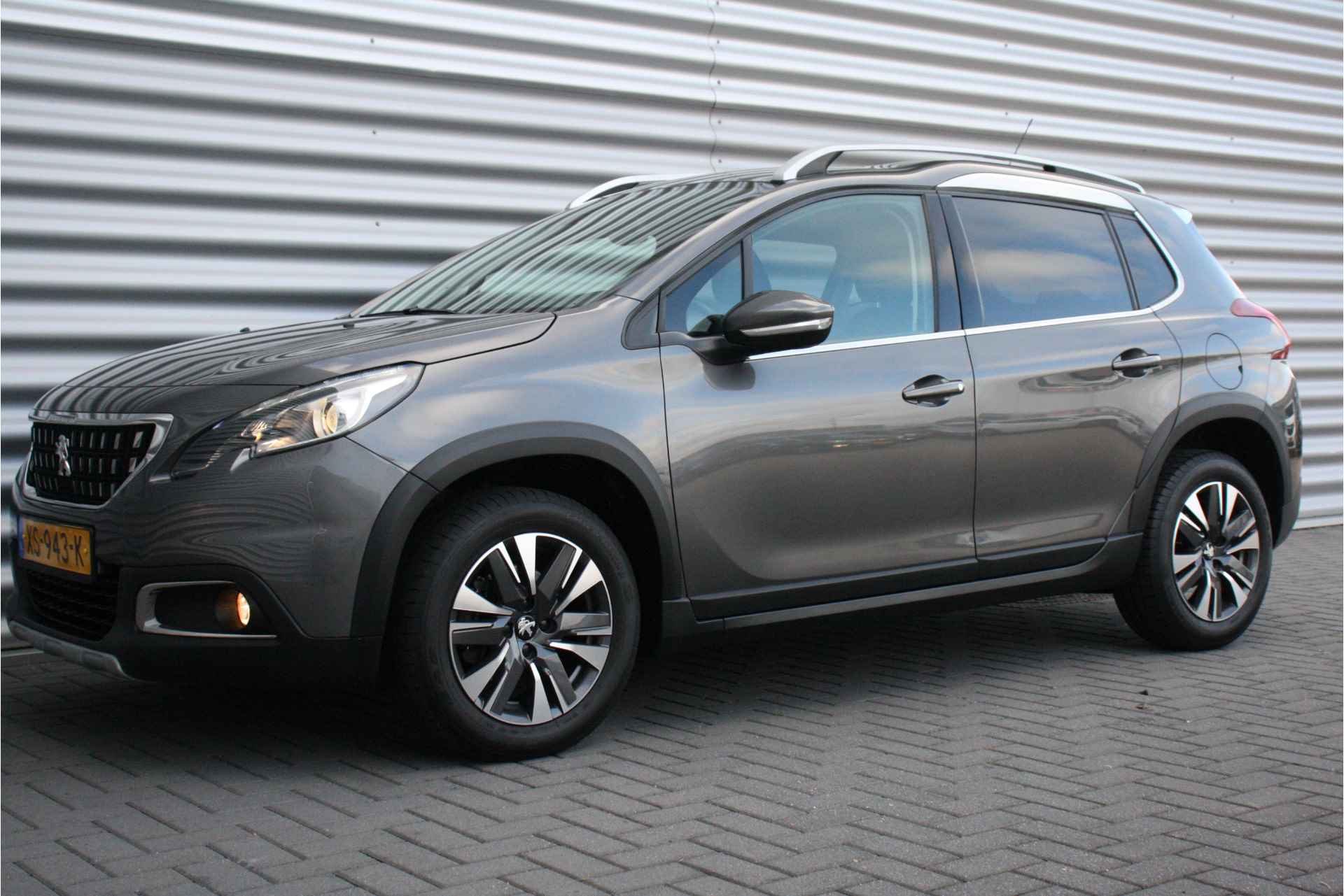 Peugeot 2008 1.2 PURETECH 110PK ALLURE AUTOMAAT / NAVI / LEDER / CLIMA / LED / PDC / 16" LMV / CAMERA / BLUETOOTH / CRUISECONTROL / NIEUWSTAA - 6/36