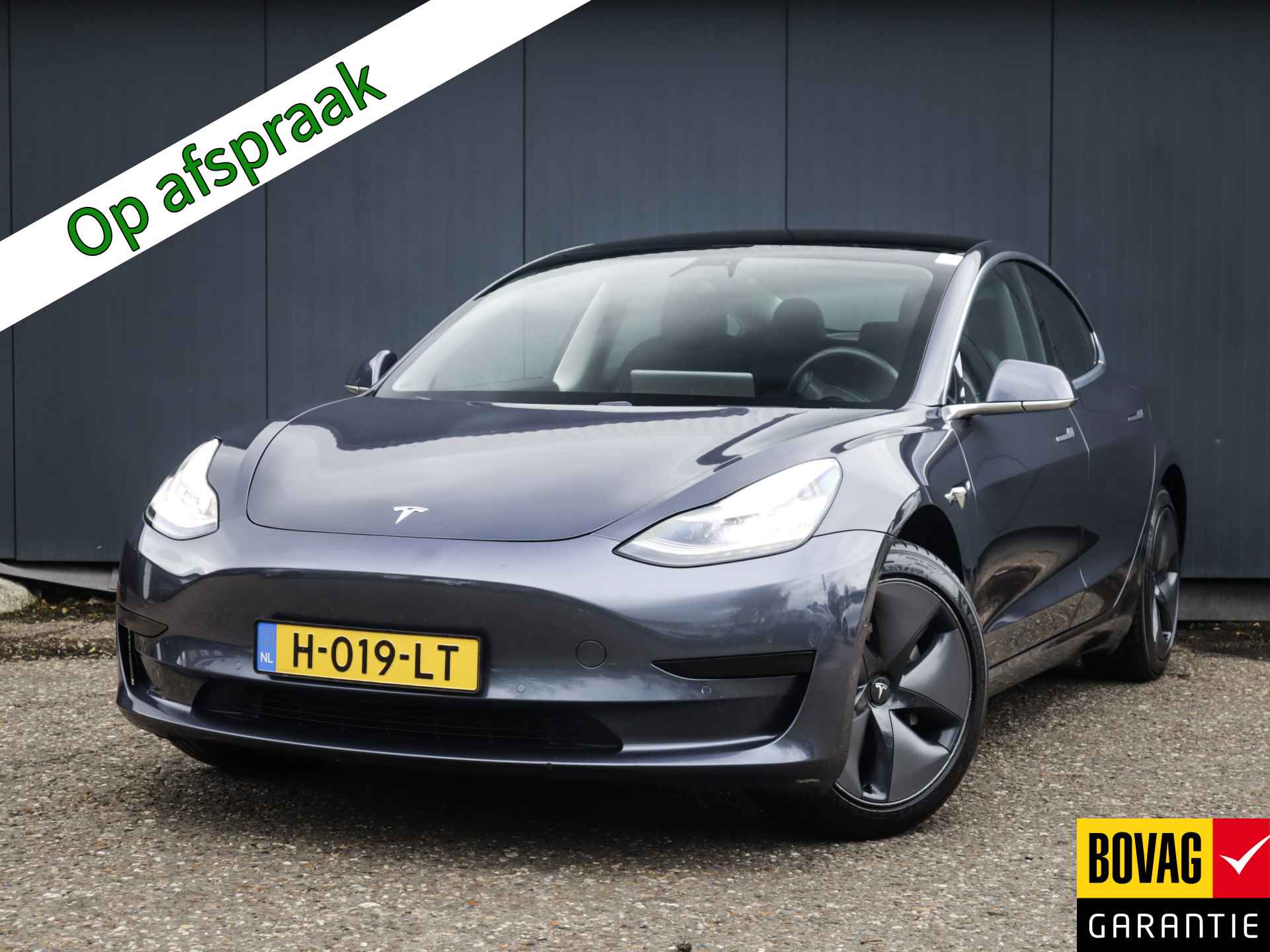 Tesla Model 3 Standard RWD Plus 60 kWh (238 PK) 1e-Eig, Tesla-Dealer-Onderh, 12-Mnd-BOVAG, NL-Auto, Panoramadak, Autopilot, Achteruitrijcamera, Keyless-Entry/Start, Parkeersensoren-V+A, Licht-Zicht-Pakket, Lm-Velgen-18Inch, Privacy-Glas - 1/37