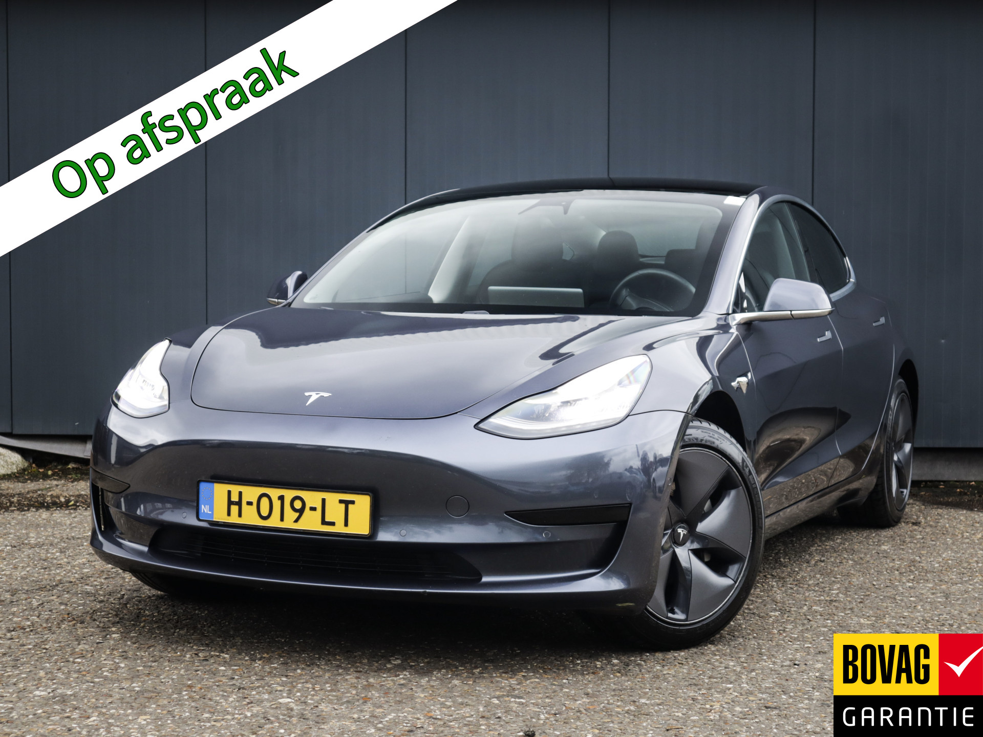 Tesla Model 3 Standard RWD Plus 60 kWh (238 PK) 1e-Eig, Tesla-Dealer-Onderh, 12-Mnd-BOVAG, NL-Auto, Panoramadak, Autopilot, Achteruitrijcamera, Keyless-Entry/Start, Parkeersensoren-V+A, Licht-Zicht-Pakket, Lm-Velgen-18Inch, Privacy-Glas