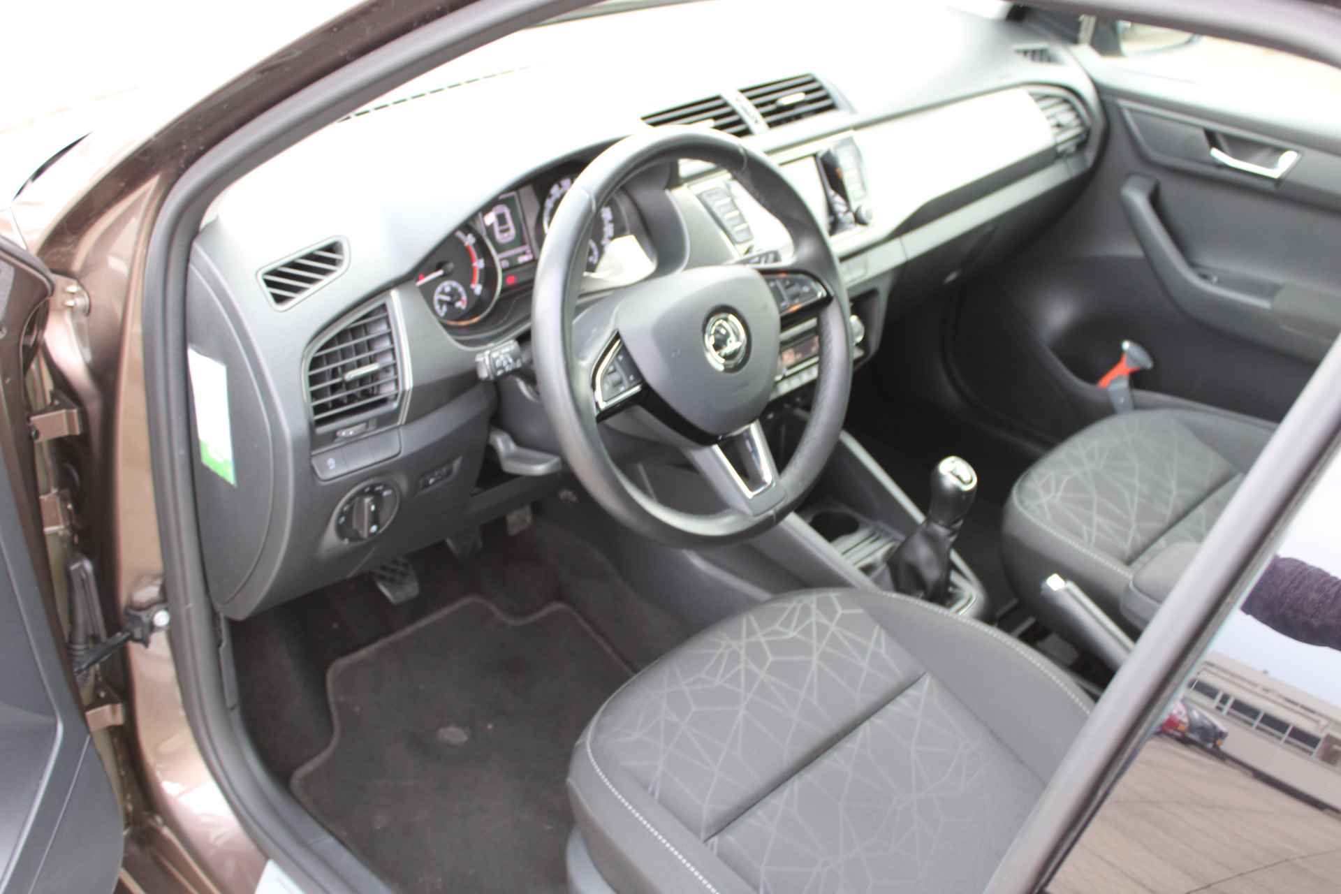 Škoda Fabia 1.0 TSI Clever Navigatie / Bluetooth / Parkeersensoren / Airco / LM velgen - 14/41