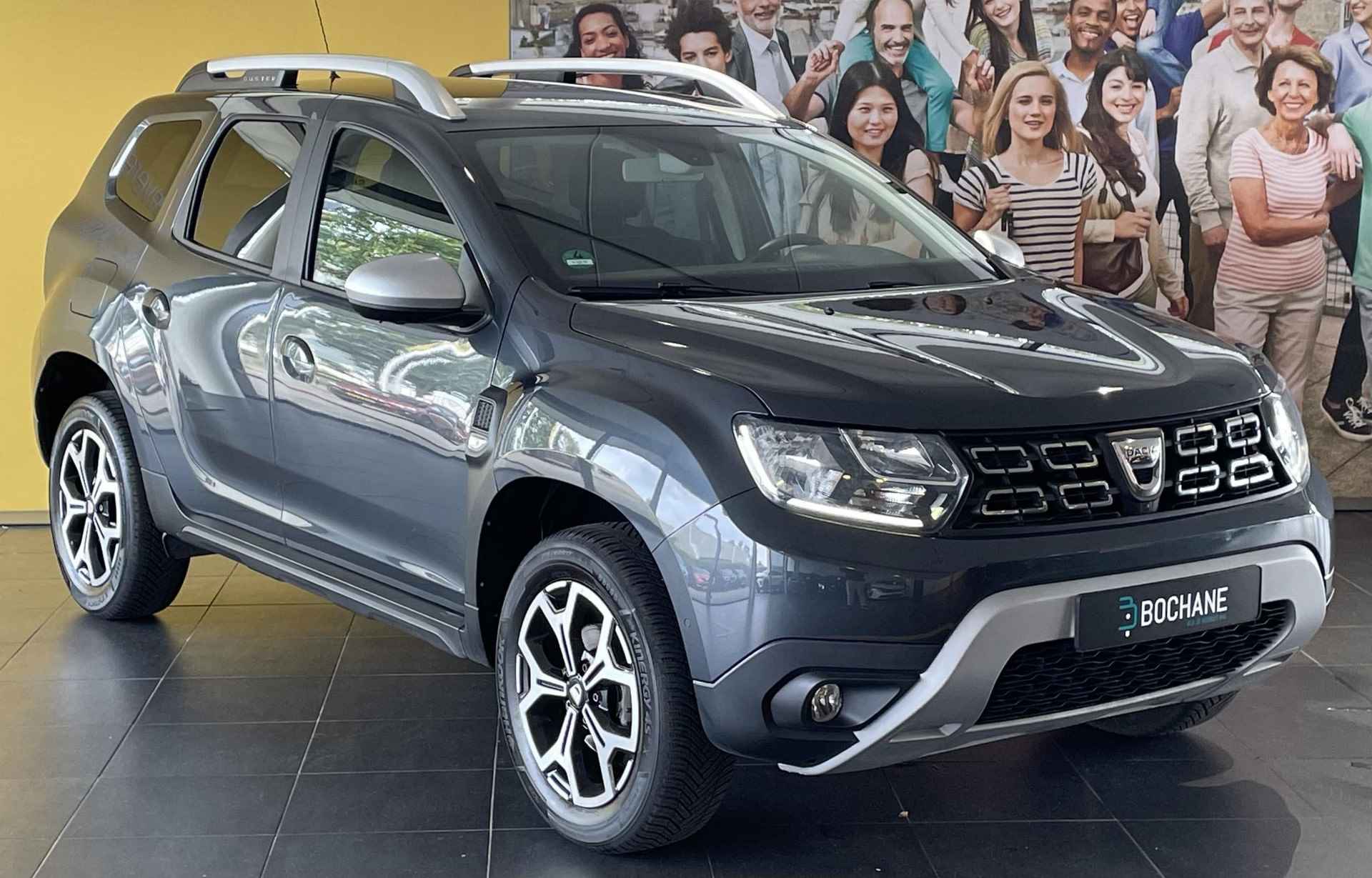 Dacia Duster 1.2 TCe 125 Prestige NAVIGATIE | RONDOM ZICHT CAMERA | PARKEERSENSOREN VOOR EN ACHTER | LEDEREN BEKLEDING MET STOELVERWARMING | LICHTMETALEN VELGEN - 12/28