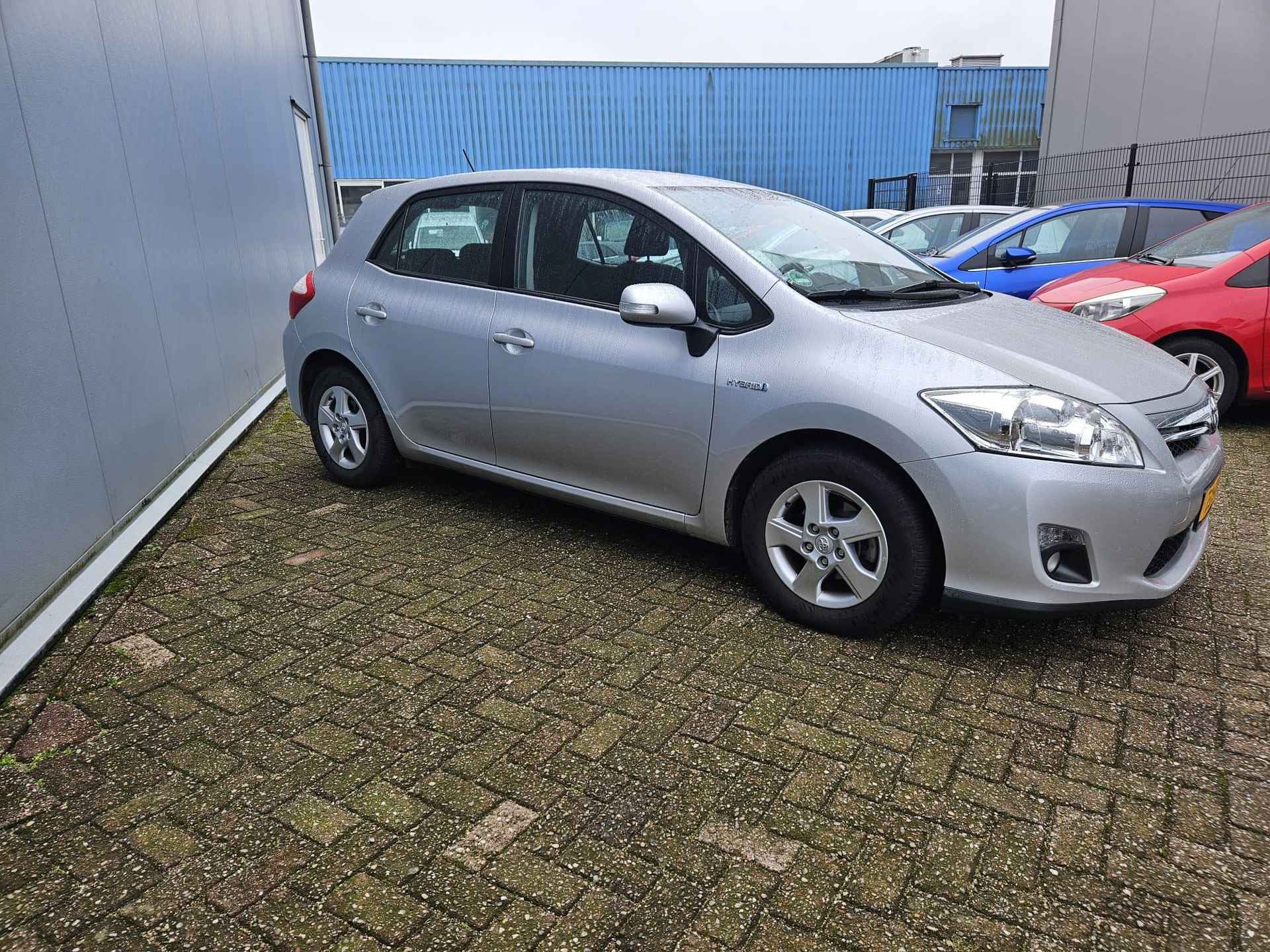 Toyota Auris 1.8 Full Hybrid Aspiration | 1e Eigenaar | NIEUW Geleverd en Onderhouden | Trekhaak | Navigatie | Camera | Climate Control | - 4/31