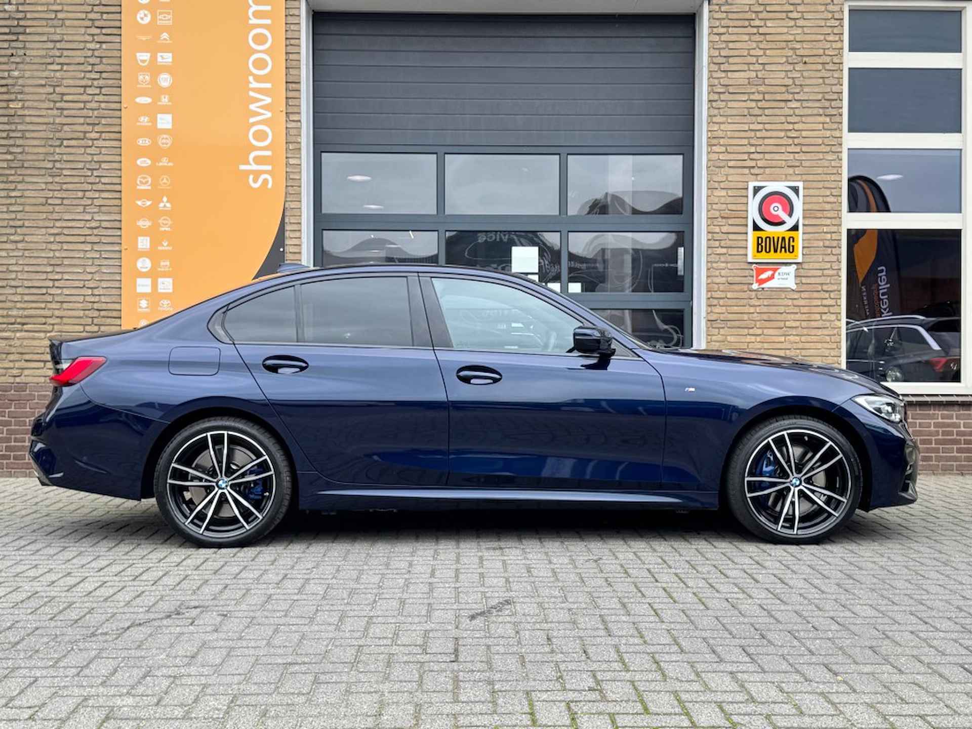 BMW 3-serie 330e M-SPORT LEER/SCHUIFDAK/HARMAN-KARDON/LED/NL-AUTO/1E EIG. - 39/54