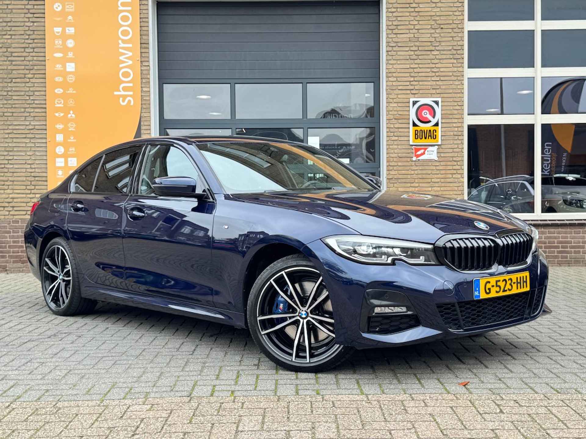 BMW 3-serie 330e M-SPORT LEER/SCHUIFDAK/HARMAN-KARDON/LED/NL-AUTO/1E EIG. - 52/54