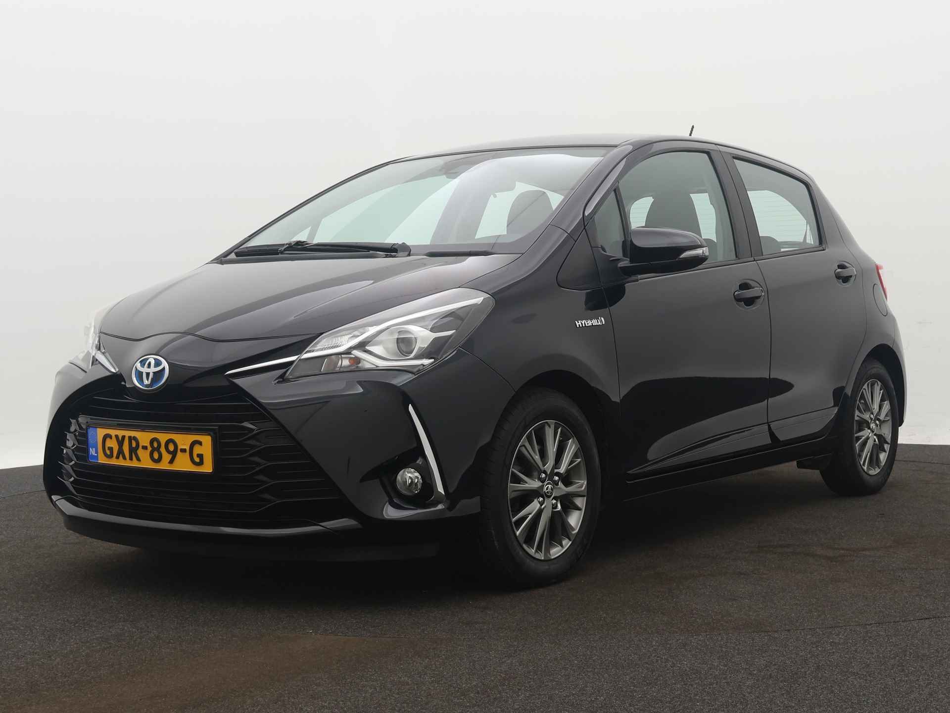 Toyota Yaris 1.5 Hybrid Design Limited | Camera | Climate Control | LM velgen | - 15/40