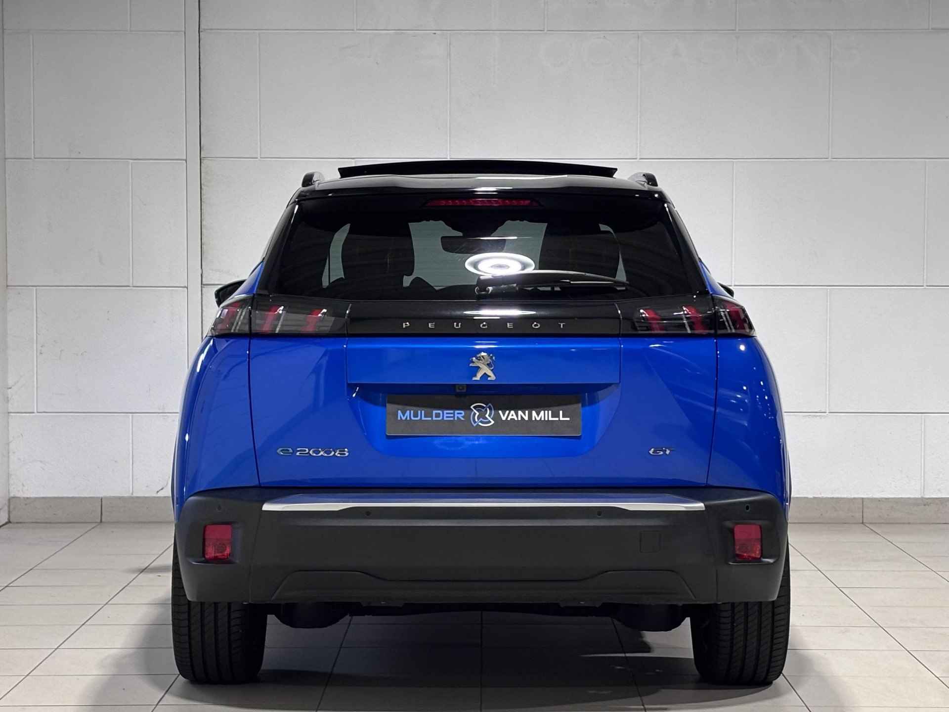 Peugeot e-2008 SUV GT Pack EV 3-FASEN 50kWh 136pk AUTOMAAT | SCHUIF/KANTELDAK | ALCANTARA/LEDER | ADAPTIVE CRUISE | SMART KEYLESS ENTRY | STOELVERW. | 18" LM-VELGEN 'EVISSA' | NAVI | CAMERA | - 7/65