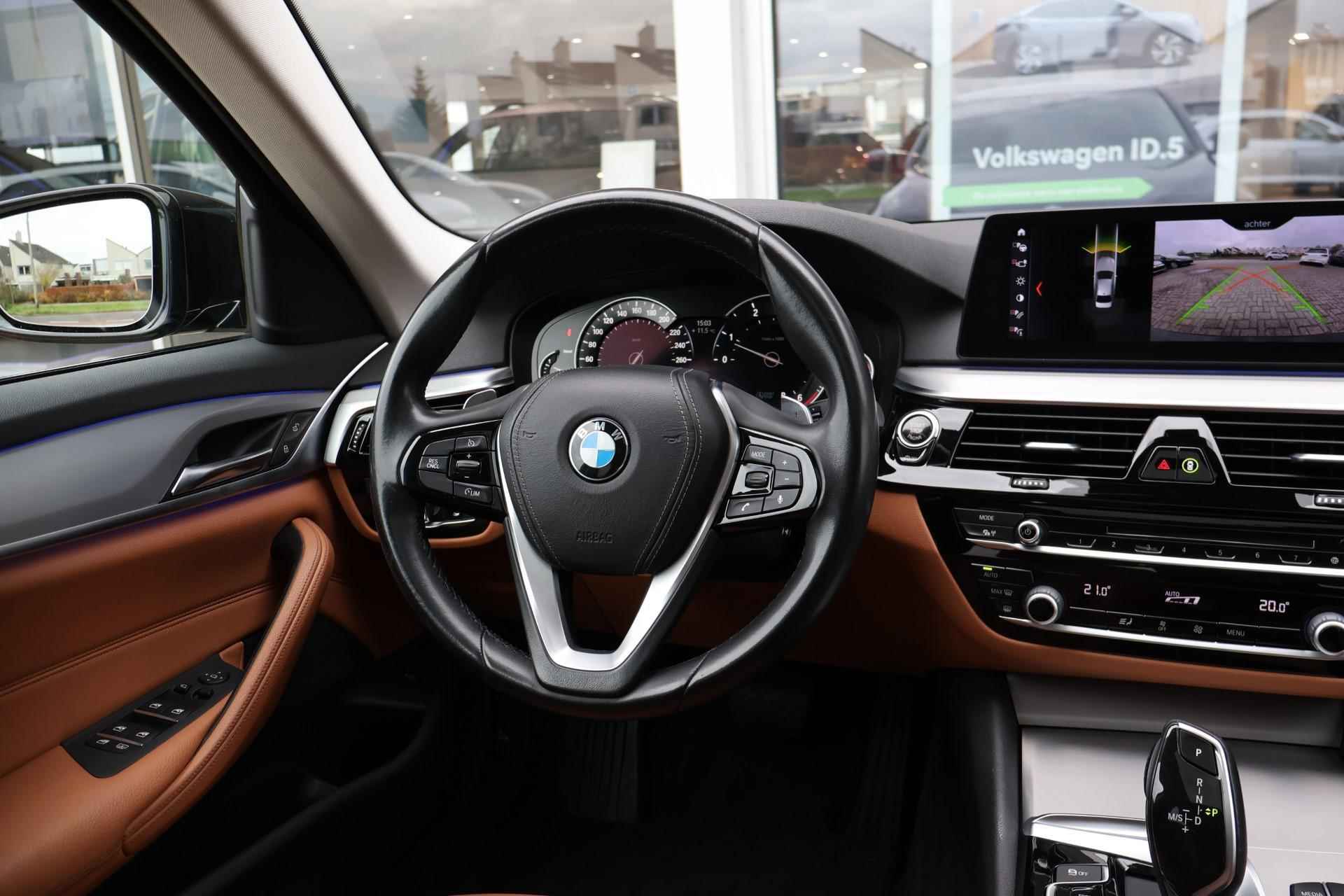 BMW 5-serie 520d 190pk High Executive Sportline | Navigatie | Schuif-/ Kanteldak | Camera | Leder - 18/41