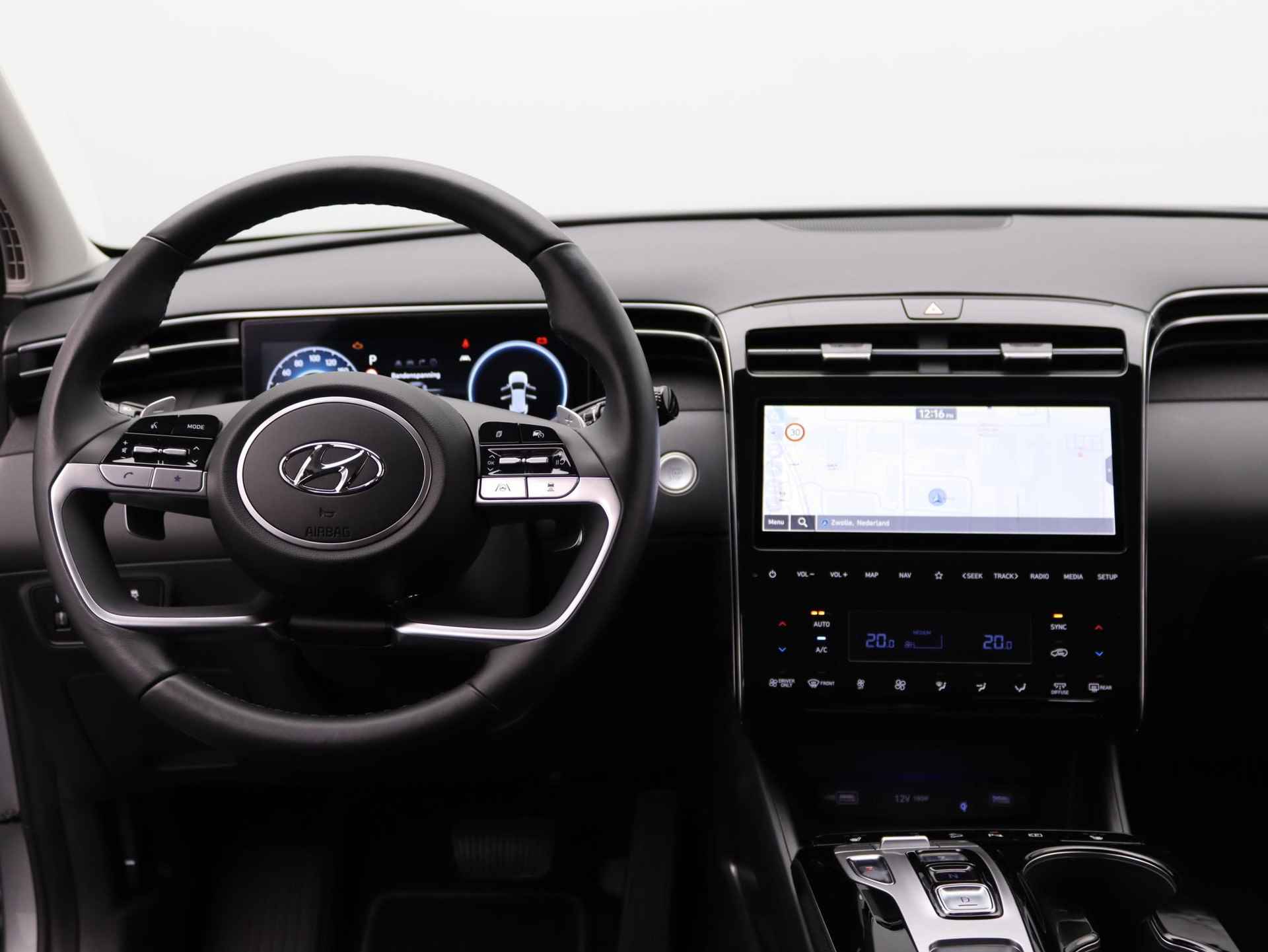 Hyundai Tucson 1.6 T-GDI HEV Comfort Smart | Hybride | Navigatie | Stoelverwarming | LED | DAB | Cruise Control | Achteruitrijcamera | Stuurverwarming | - 11/48