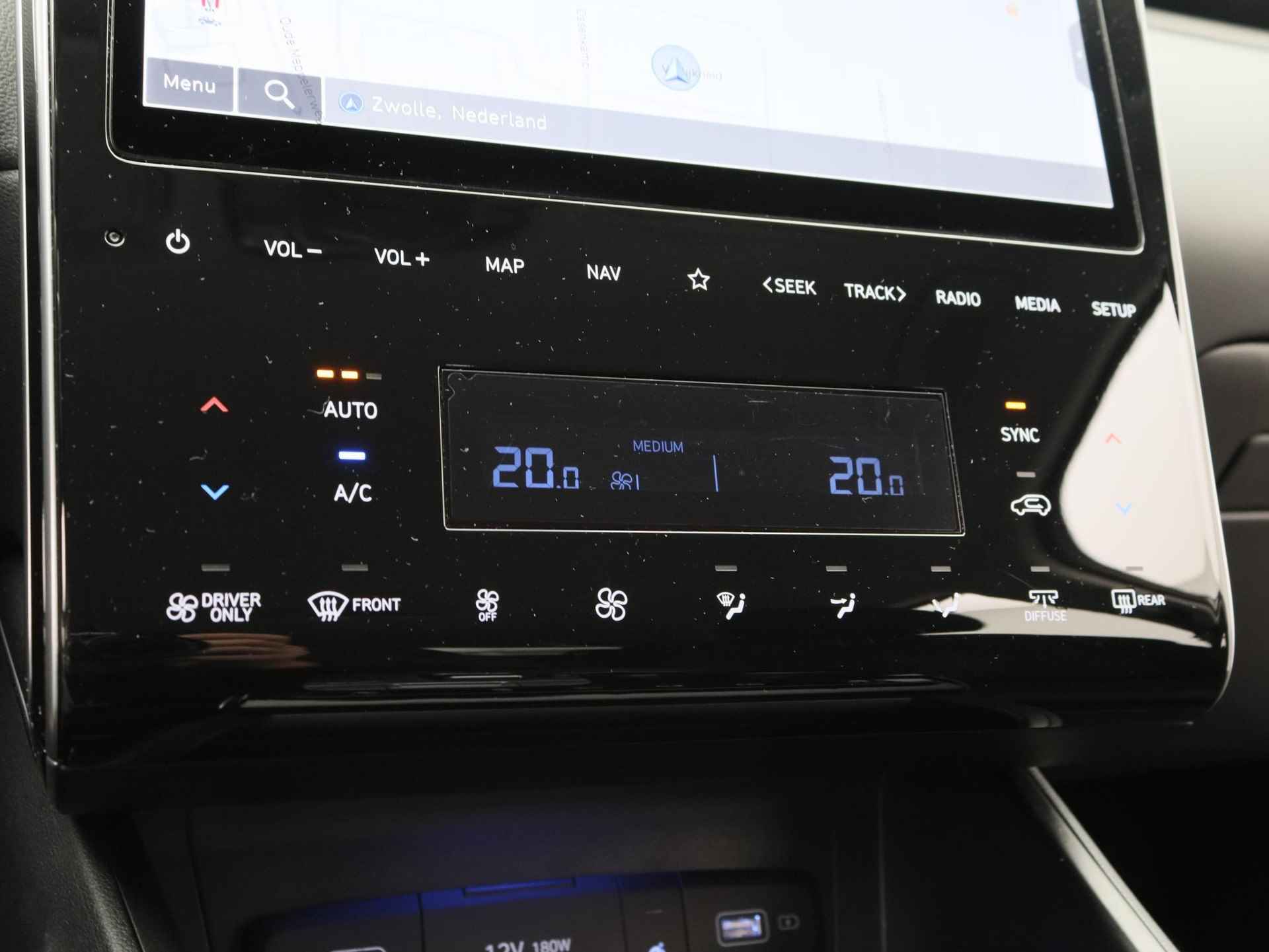 Hyundai Tucson 1.6 T-GDI HEV Comfort Smart | Hybride | Navigatie | Stoelverwarming | LED | DAB | Cruise Control | Achteruitrijcamera | Stuurverwarming | - 23/48