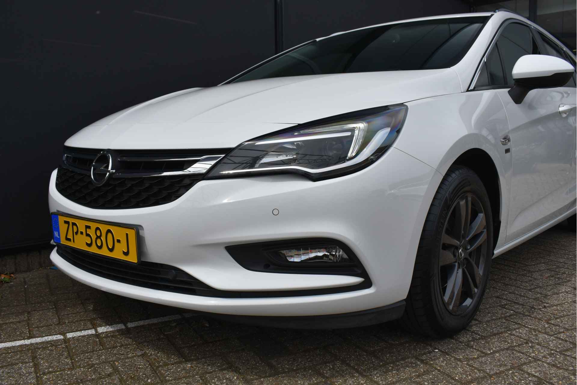 Opel Astra Sports Tourer 1.0 Turbo 120 Jaar Edition+ | Navigatie | Climate Control | PDC vóór & achter | 1e Eigenaar | Dealeronderhouden | - 32/47