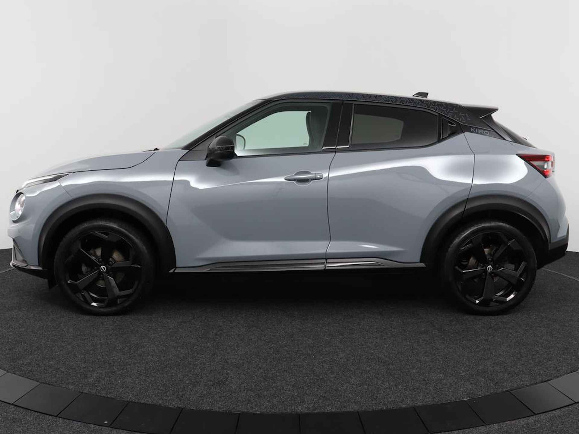 Nissan Juke 1.0 DIG-T Kiiro | Navigatie | Two-Tone | Afn. Trekhaak | Privacy Glass | Stoelverwarming | Climate Control | Eerste Eigenaar - 7/42