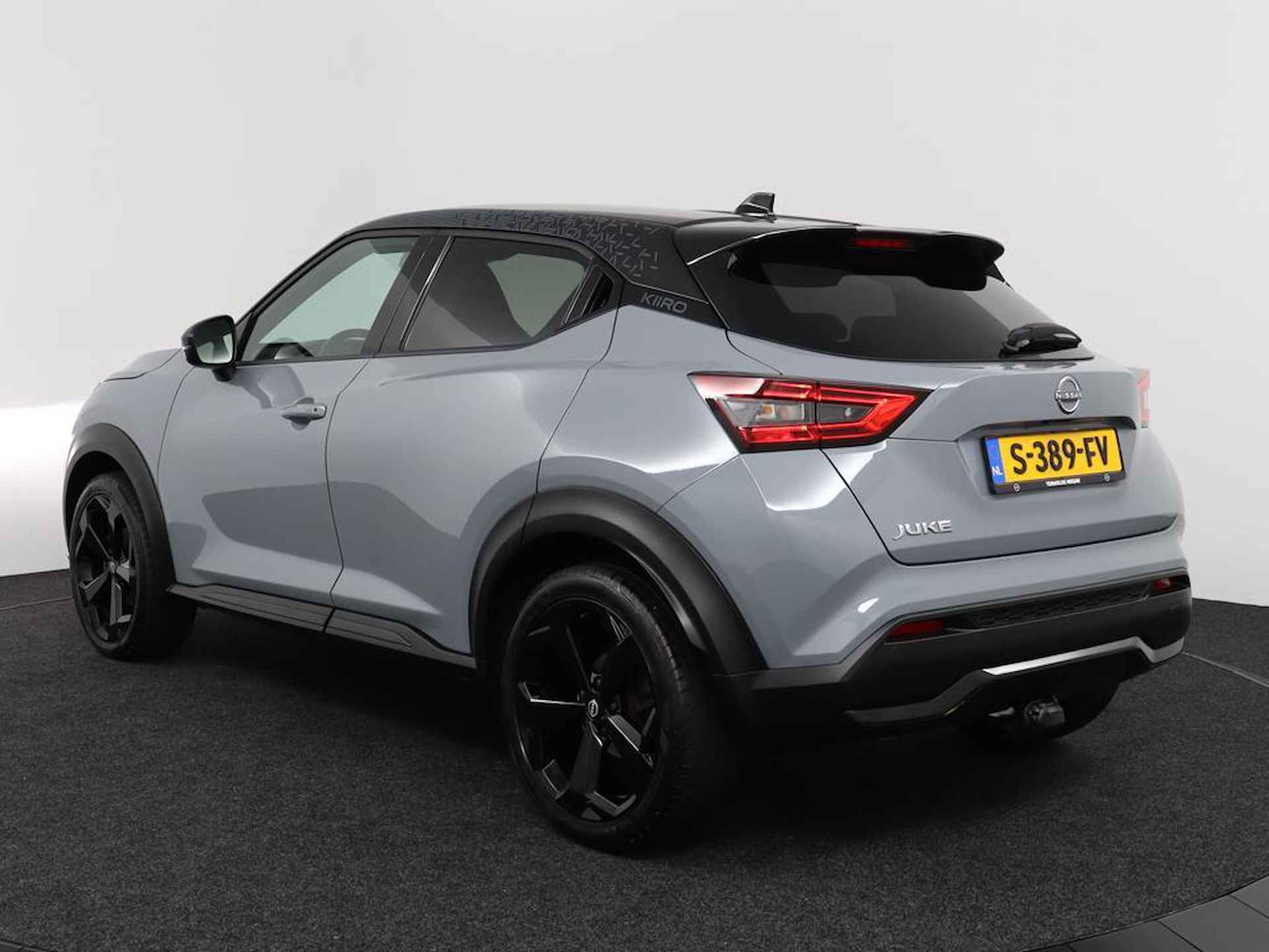 Nissan Juke 1.0 DIG-T Kiiro | Navigatie | Two-Tone | Afn. Trekhaak | Privacy Glass | Stoelverwarming | Climate Control | Eerste Eigenaar - 14/42