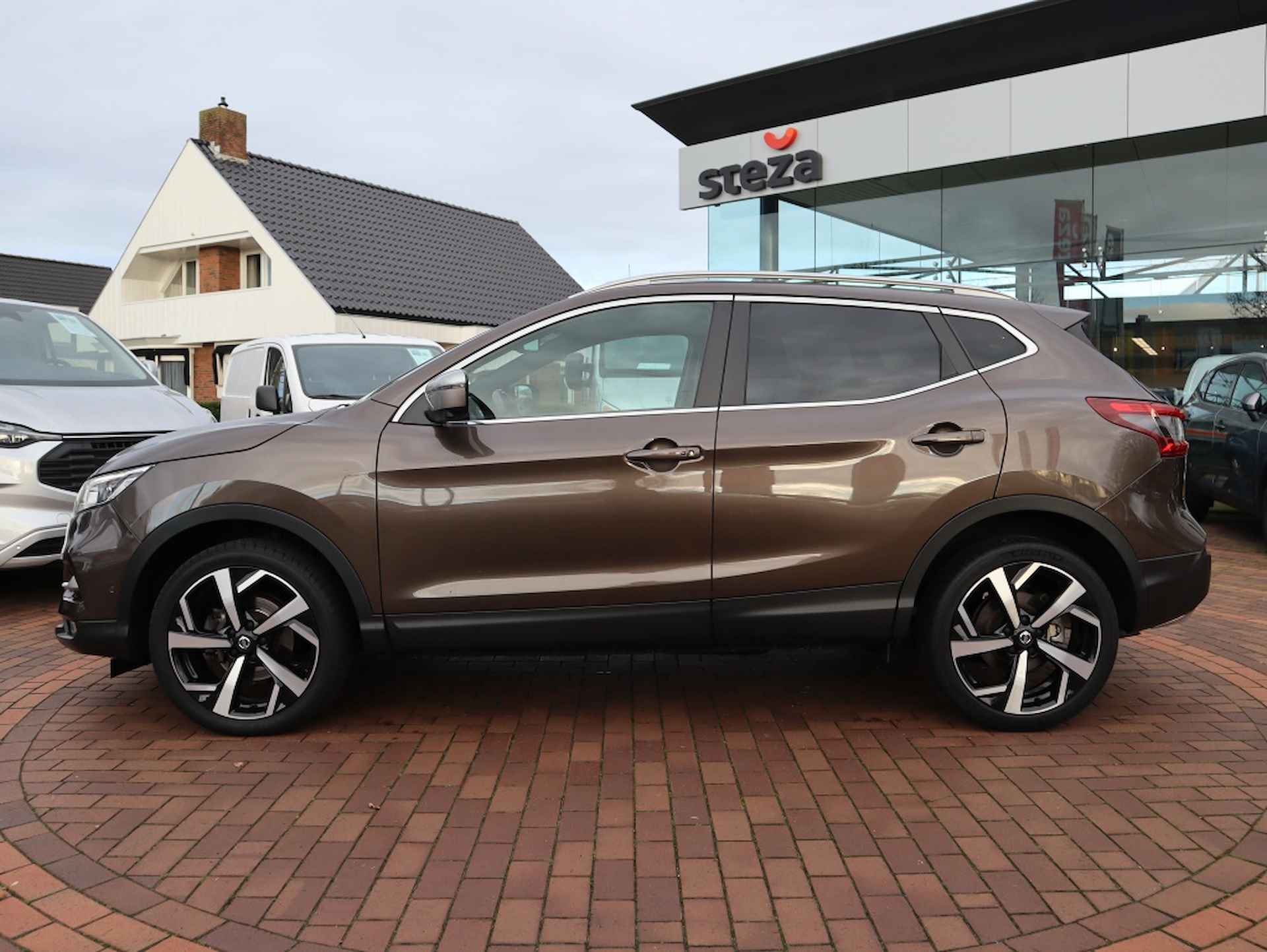 Nissan Qashqai 1.2 Tekna + / Navigatie / Stoelverwarming / Trekhaak - 5/34