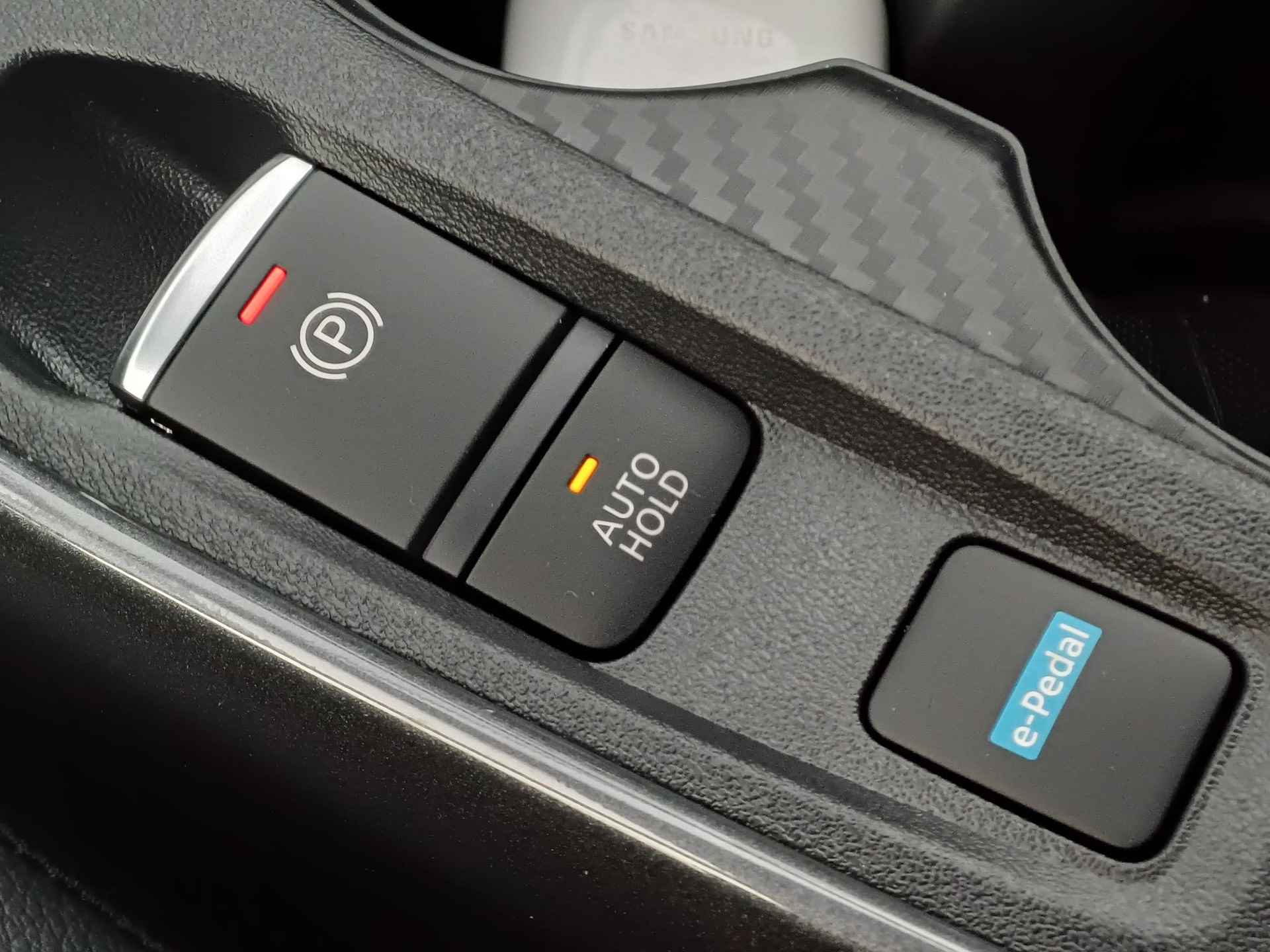 Nissan Juke 1.6 Hybrid 143 N-Design Automaat / Lichtmetalen Velgen / Parkeersensoren icm Camera / Navigatie / Cruise Control / Apple Carplay - 23/27