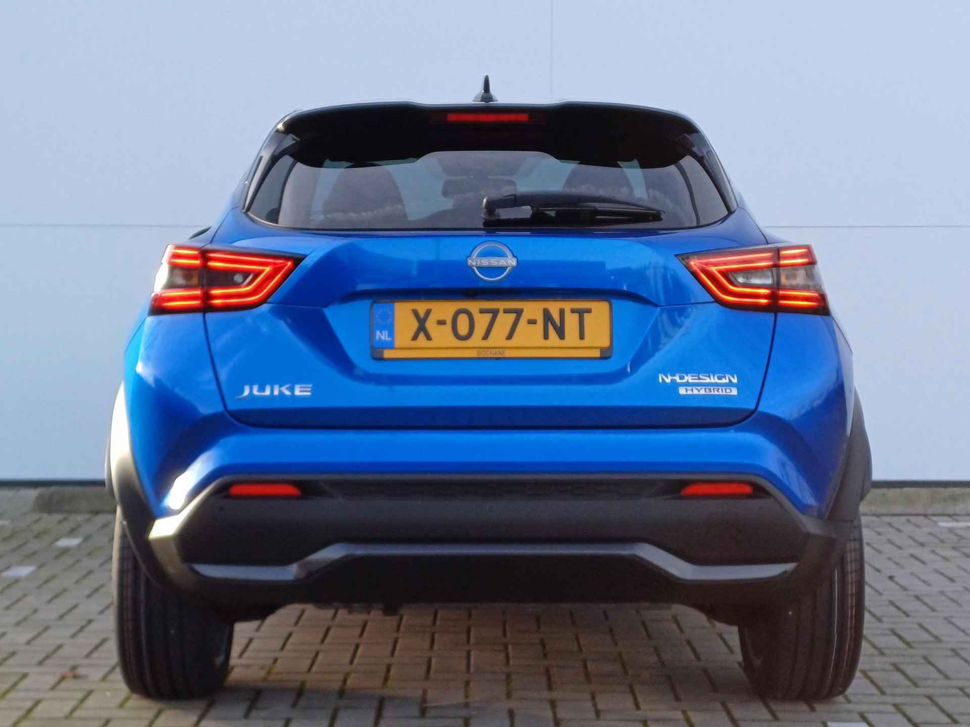 Nissan Juke 1.6 Hybrid 143 N-Design Automaat / Lichtmetalen Velgen / Parkeersensoren icm Camera / Navigatie / Cruise Control / Apple Carplay - 12/27