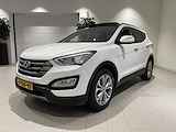 Hyundai Santa Fe 2.4i GDI 4WD i-Catcher 7p. 192 PK | Automaat | 7-Persoons | Panoramadak | Lederen Bekleding | Trekhaak | Cruise Control | Stoelverwarming | Achterbankverwarming | Achterruitrijcamera | Parkeersensoren | Airco | Bluetooth |