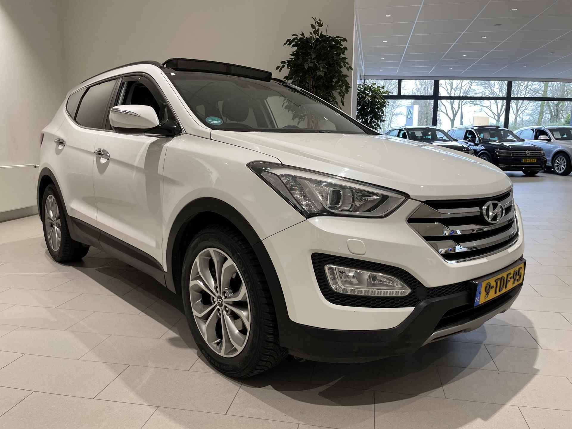 Hyundai Santa Fe 2.4i GDI 4WD i-Catcher 7p. 192 PK | Automaat | 7-Persoons | Panoramadak | Lederen Bekleding | Trekhaak | Cruise Control | Stoelverwarming | Achterbankverwarming | Achterruitrijcamera | Parkeersensoren | Airco | Bluetooth | - 8/32