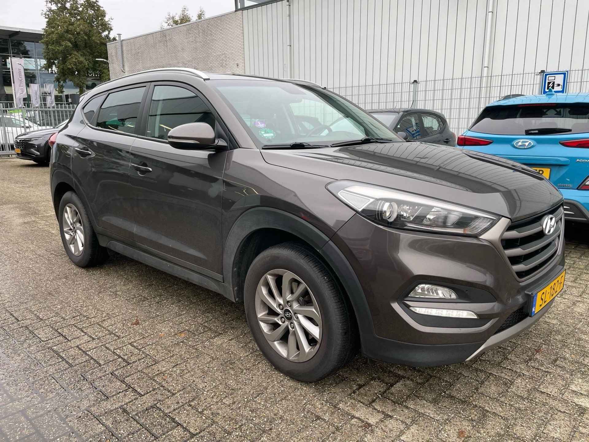 Hyundai Tucson 1.6 GDi i-Motion Navigatie / Camera / Cruise Control / Trekhaak  / Stoelverwarming. - 2/20