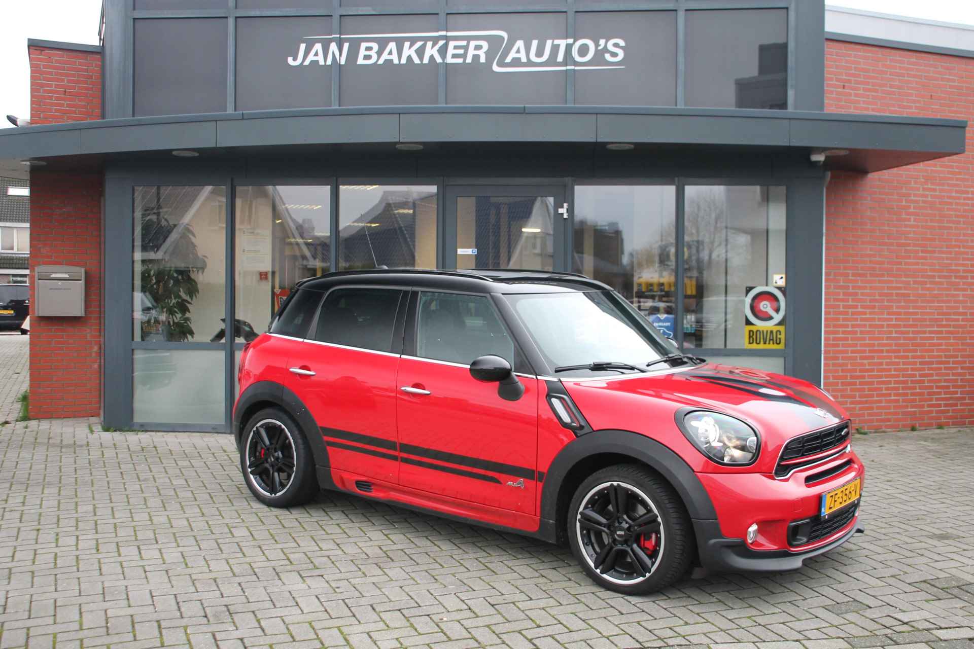 MINI Countryman 1.6 John Cooper Works ALL4 Chili ✅ Panoramadak ✅ Navi ✅ 218PK ✅ jaar garantie - 4/23