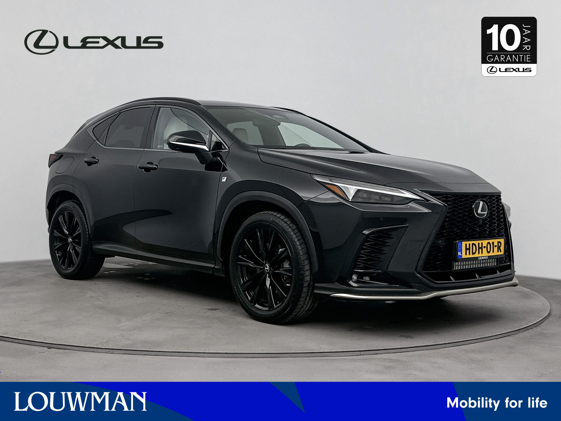 Lexus NX 450h+ AWD F Sport Line | Stoel en stuurwiel verwarmd | LM velgen | Draadloze telefoonlader | Navigatie | 360 Camera | Dodehoek Ass. |